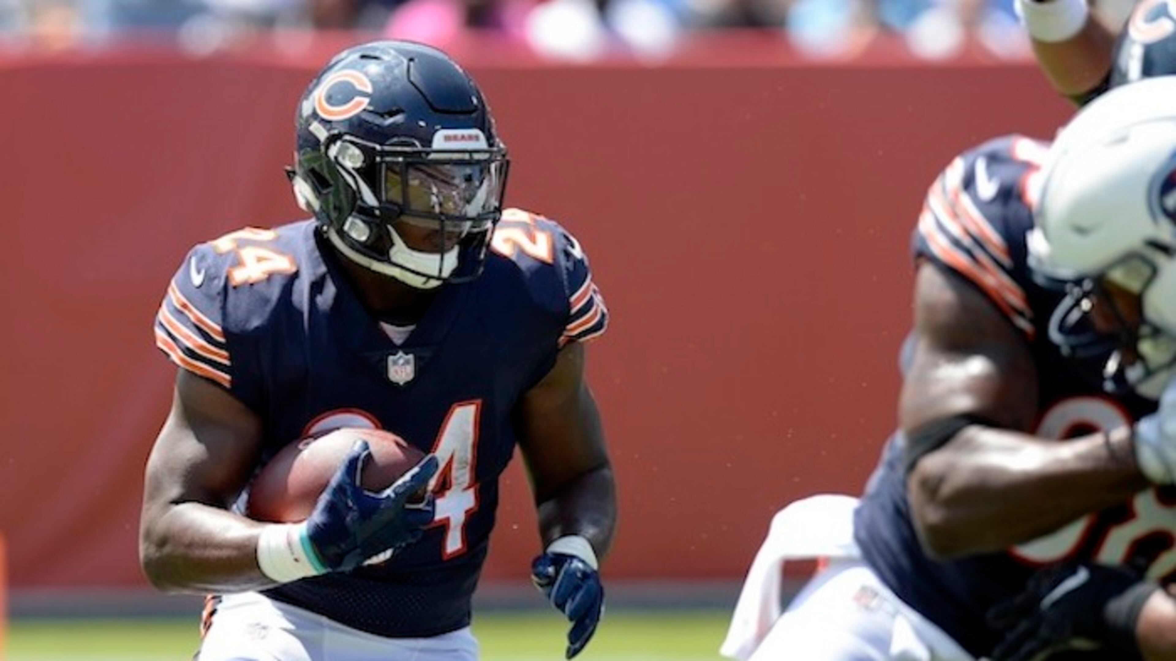 In this Sunday, Aug. 27, 2017 file photo, Chicago Bears running back Jordan Howard (24) runs the ball against the Tennessee Titans in the first half of an NFL football preseason game in Nashville, Tenn. Aaron Rodgers and the Green Bay Packers have regained their hold on the NFC North after a one-year lapse. The Minnesota Vikings, Detroit Lions and Chicago Bears will have to go through Lambeau Field once again if they're going to take the division. (AP Photo/Mark Zaleski, File)