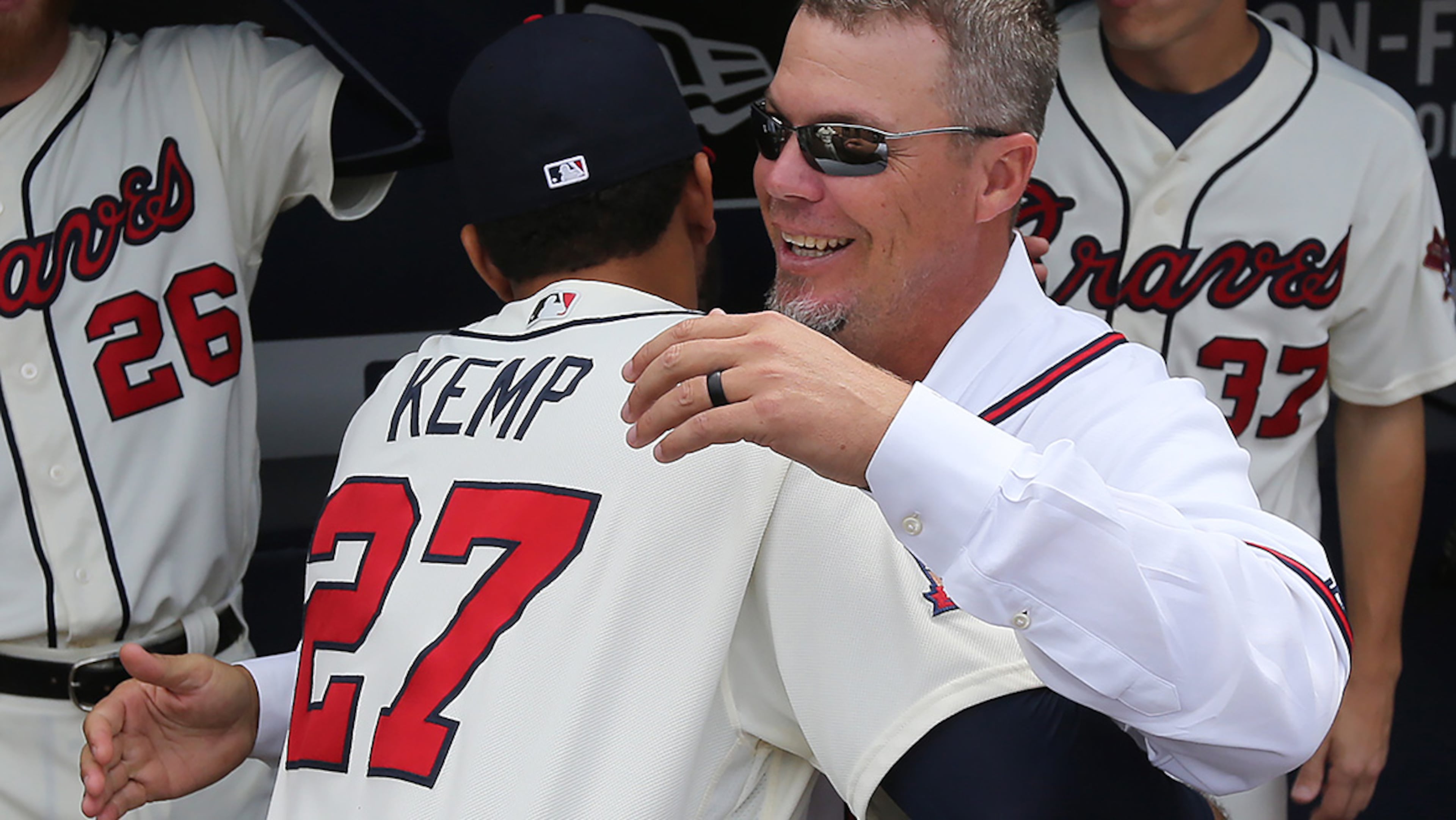 October 02, 2016 Atlanta: Chipper Jones gives Matt Kemp a hug in the dugout during the final game at Turner Field on Sunday, Oct. 2, 2016, in Atlanta. Curtis Compton /ccompton@ajc.com