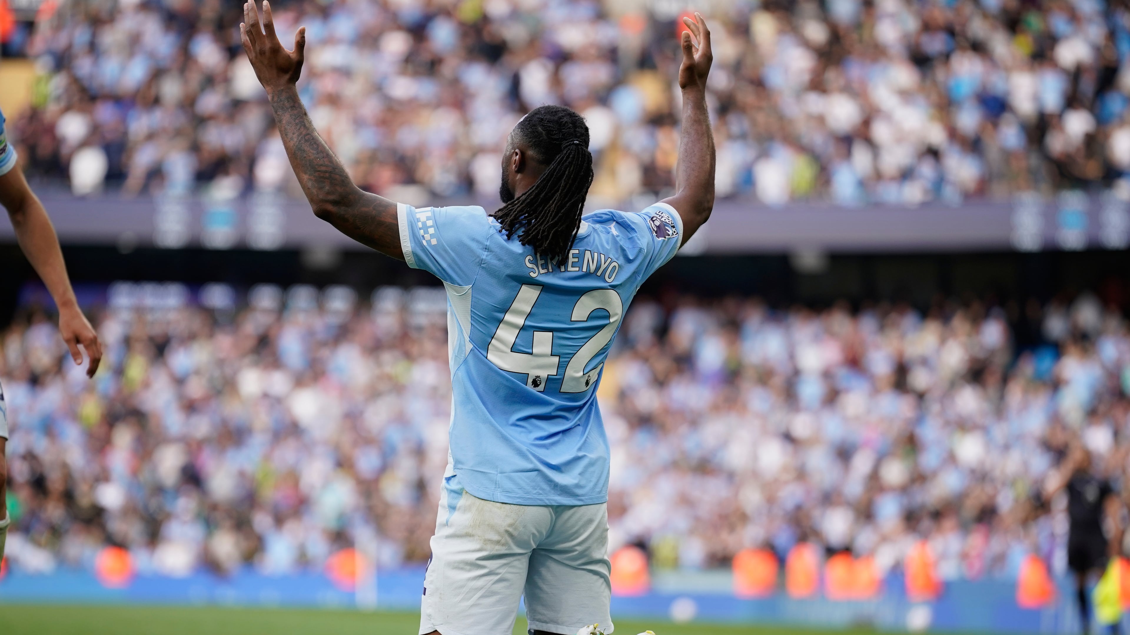 Manchester City's Antoine Semenyo reacts after scoring third goal during the English Premier League soccer match between Manchester City and Sunderland in Manchester, England, Sunday, Sept. 20, 2026. (AP Photo/Dave Thompson)