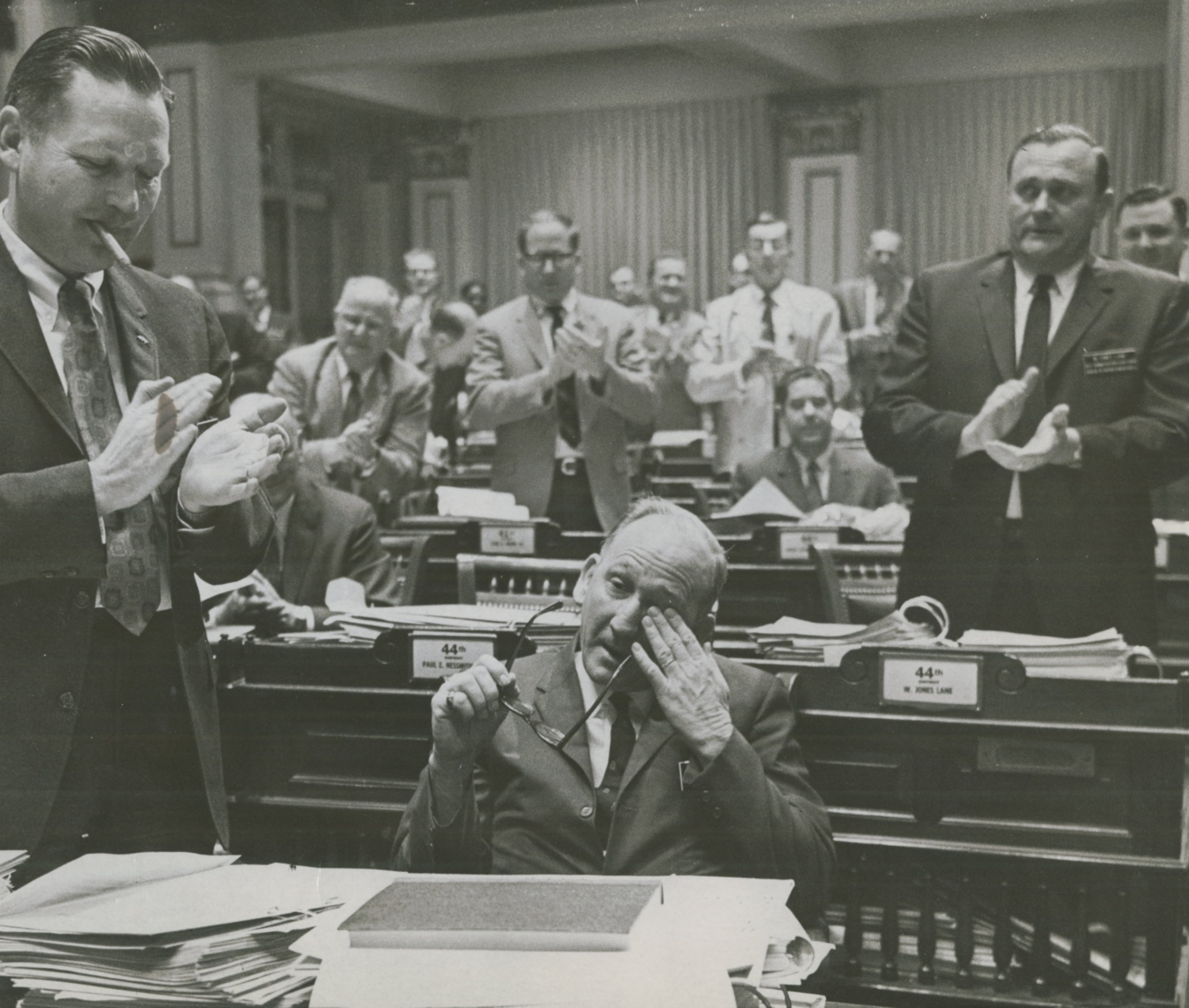 Tom Murphy wipes a tear from his eye during a standing ovation which commended his work as administration floor leader during the session of the Georgia Legislature in 1969 (AP)