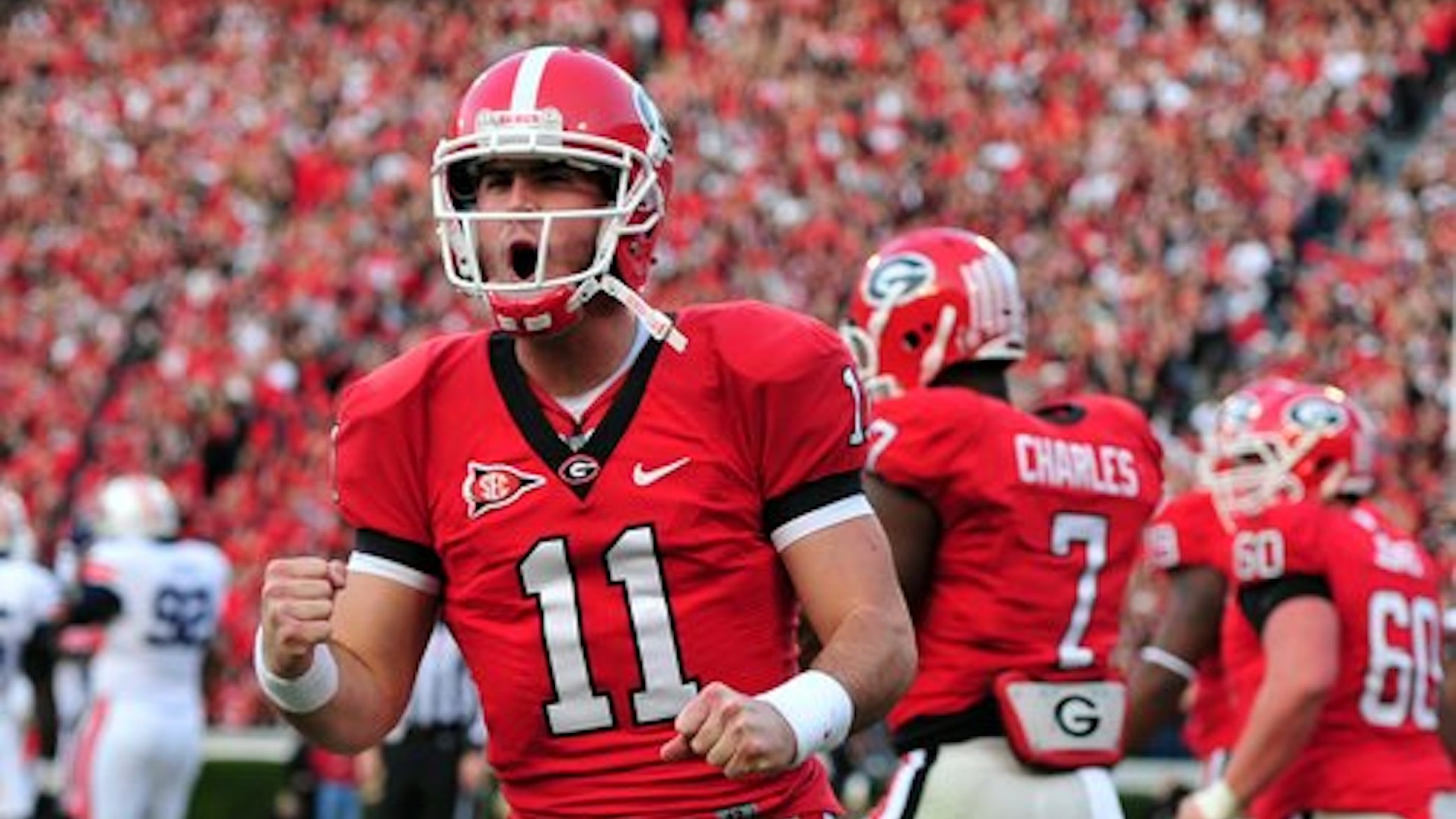 Current SEC Network game analyst Aaron Murray — who still holds the Georgia record for passing yards and passing touchdowns — played quarterback for the Bulldogs from 2010-13. (Brant Sanderlin/AJC)