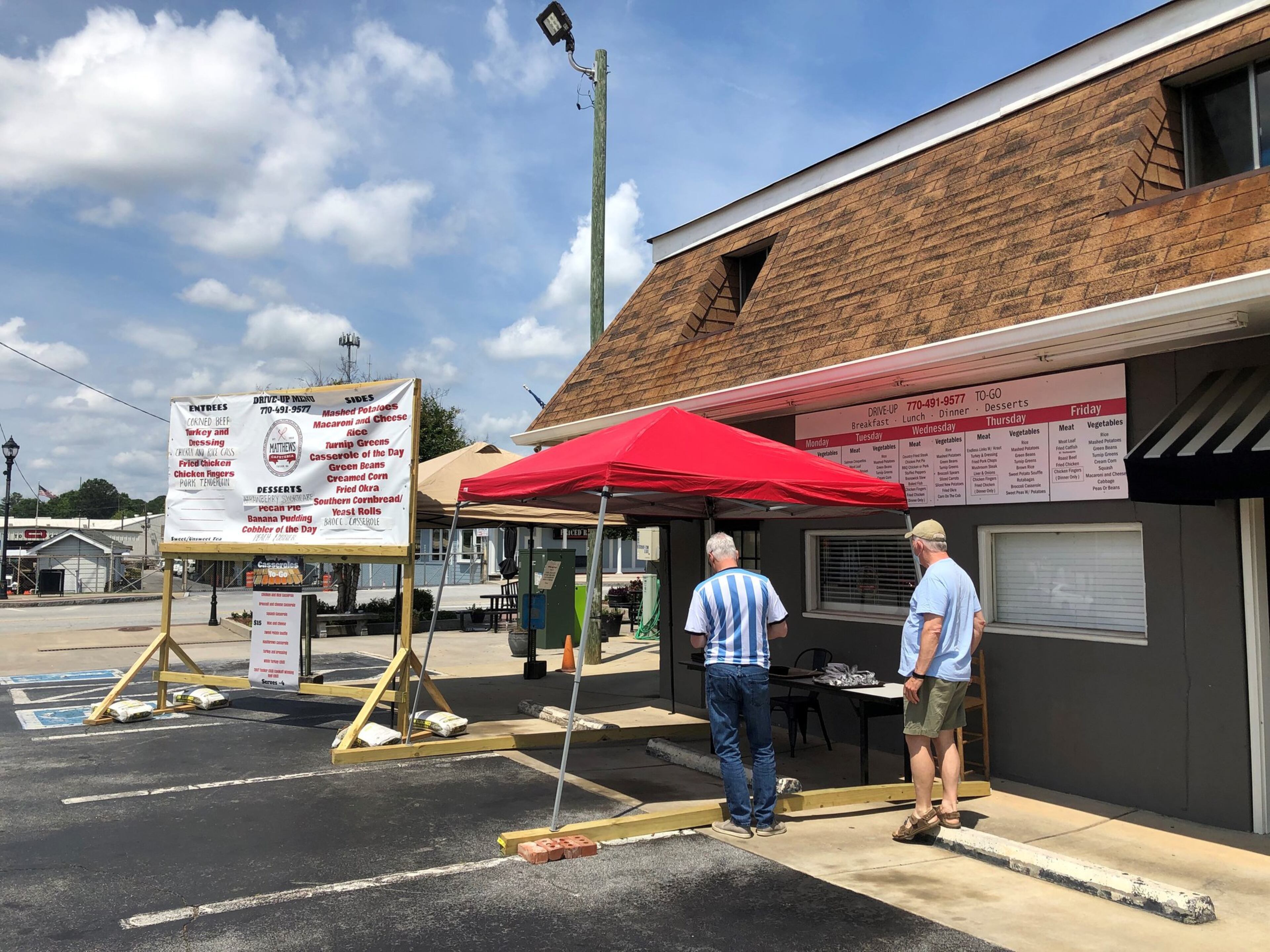 Customers wait for carry-out orders at Matthews Cafeteria in Tucker. Contributed by Wendell Brock