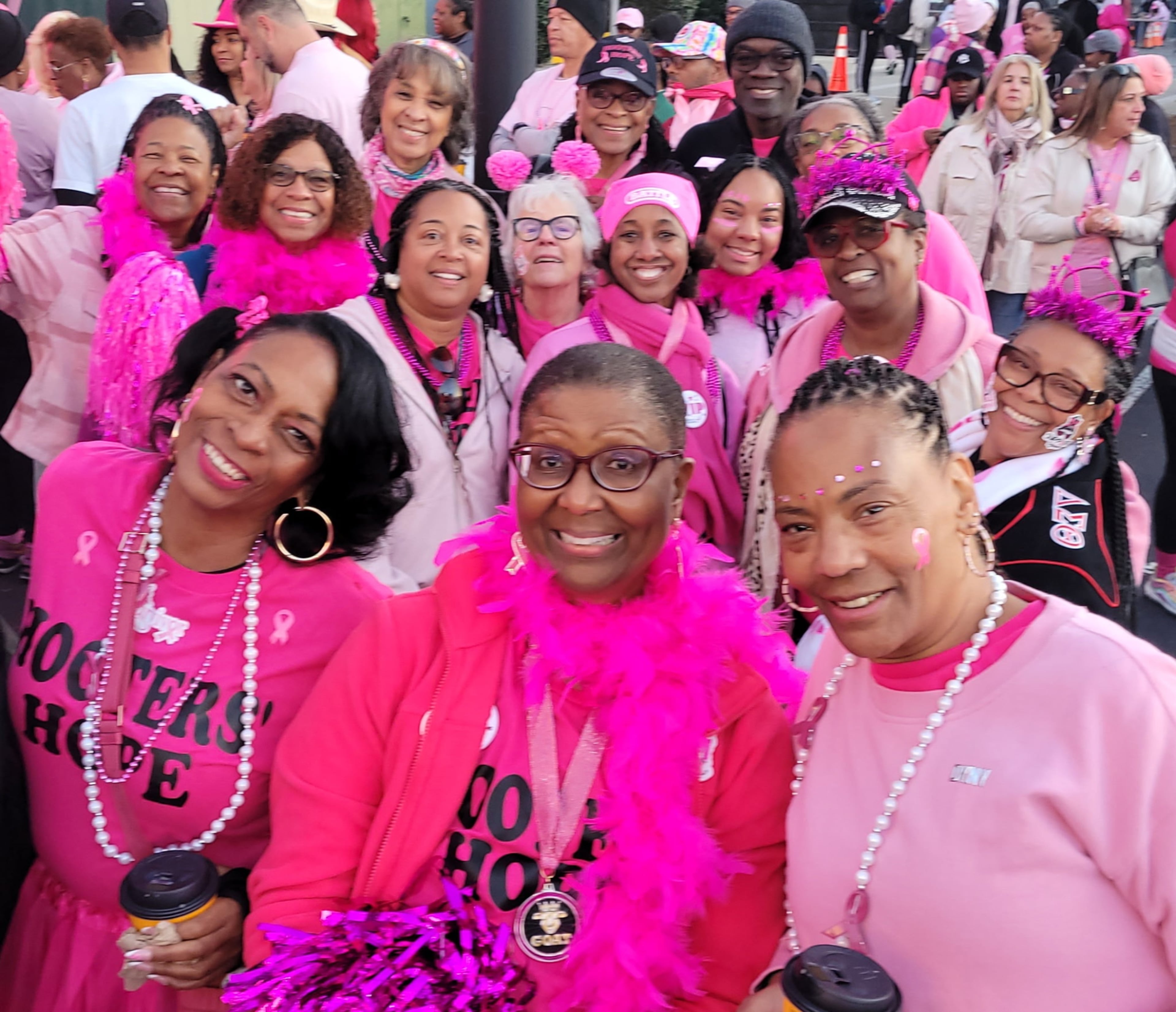 Alecia Robinson (center) with her Hooters' Hope team at last year's Susan G. Komen Race for the Cure event. (Courtesy of Sisters by Choice)