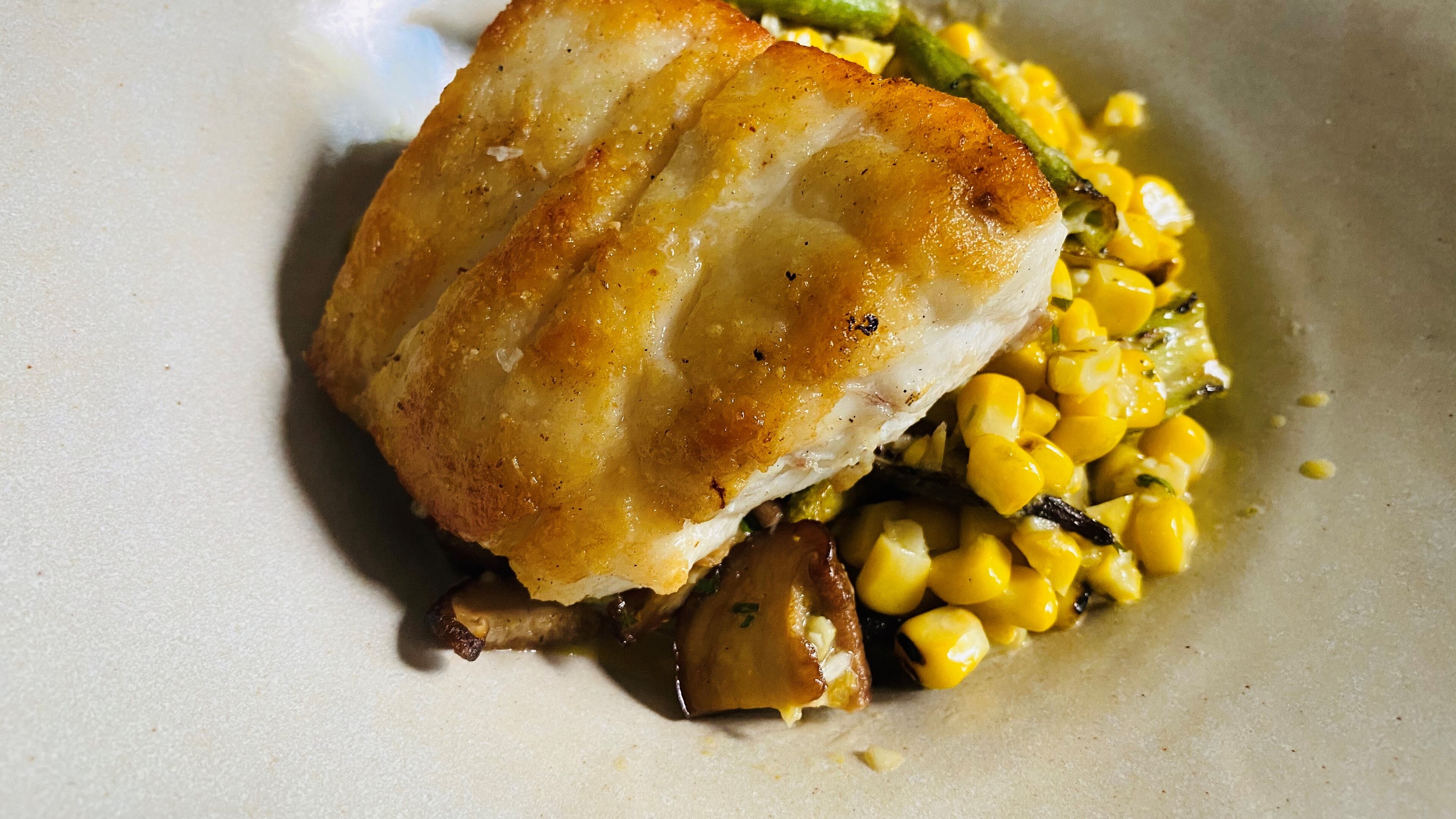 Kimball House offers grouper, with okra, shiitake mushrooms and corn. Bob Townsend/For The AJC
