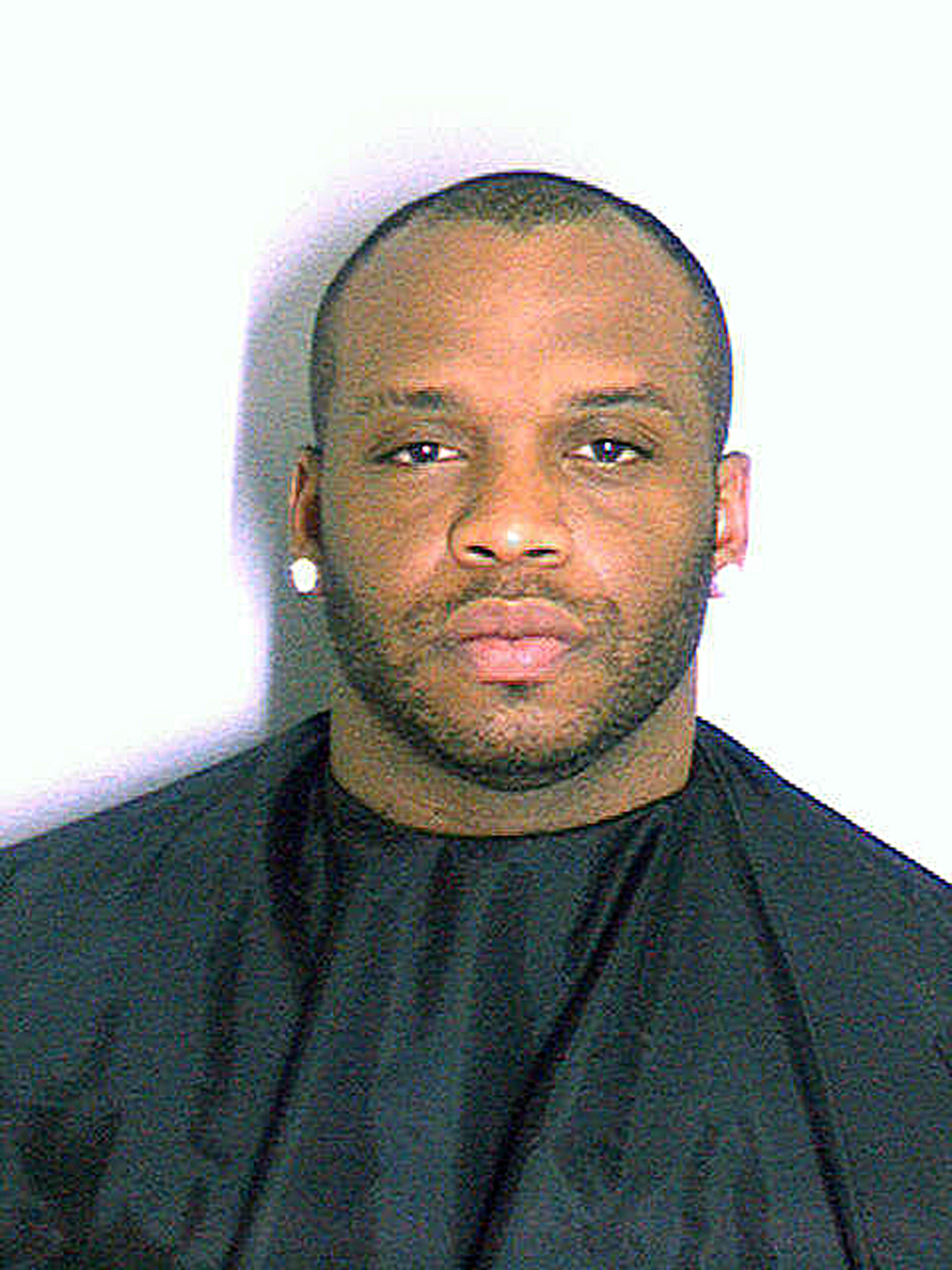 This undated photo provided by the Dekalb County Police, Tuesday, July 29, 2014, shows Arizona Cardinals NFL football player John Abraham. Authorities say the former Atlanta Falcons player, who has been absent from the Arizona Cardinals training camp since Friday, was arrested a month ago in suburban Atlanta. The jail records state that Abraham was charged with driving under the influence involving alcohol; and stopping, standing or parking in a prohibited place. (AP Photo/Dekalb County Police) This undated photo provided by the Dekalb County Police, Tuesday, July 29, 2014, shows Arizona Cardinals NFL football player John Abraham. Authorities say the former Atlanta Falcons player, who has been absent from the Arizona Cardinals training camp since Friday, was arrested a month ago in suburban Atlanta. The jail records state that Abraham was charged with driving under the influence involving alcohol; and stopping, standing or parking in a prohibited place. (AP Photo/Dekalb County Police)