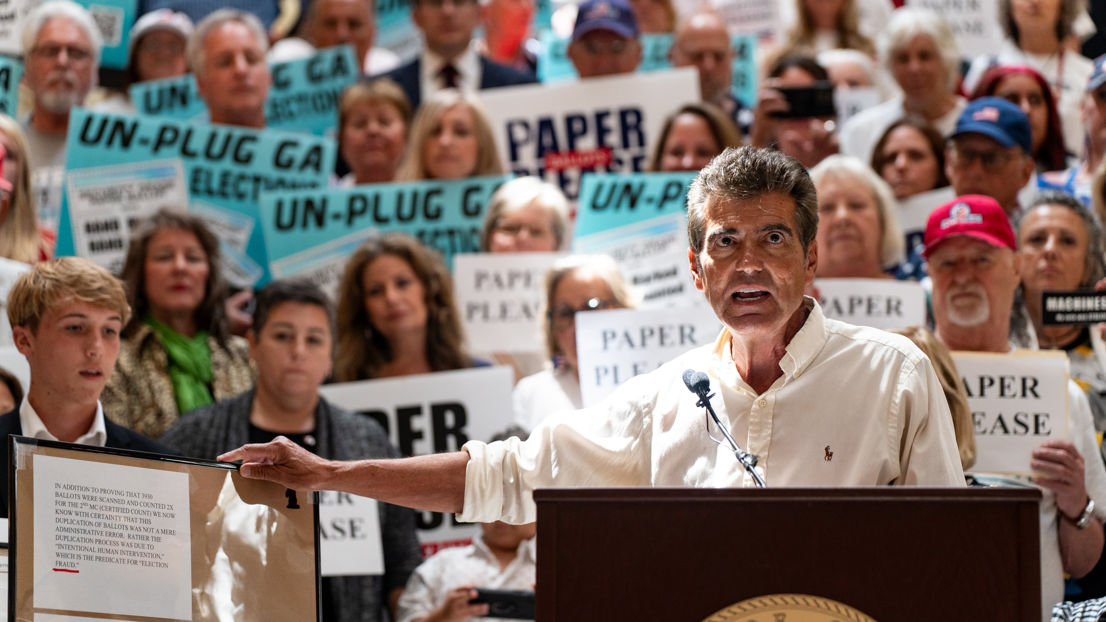 Houston County resident Joe Rossi speaks about ballot counting problems in the 2020 election at a news conference at the Georgia State Capitol in Atlanta on Tuesday, August 6, 2024.