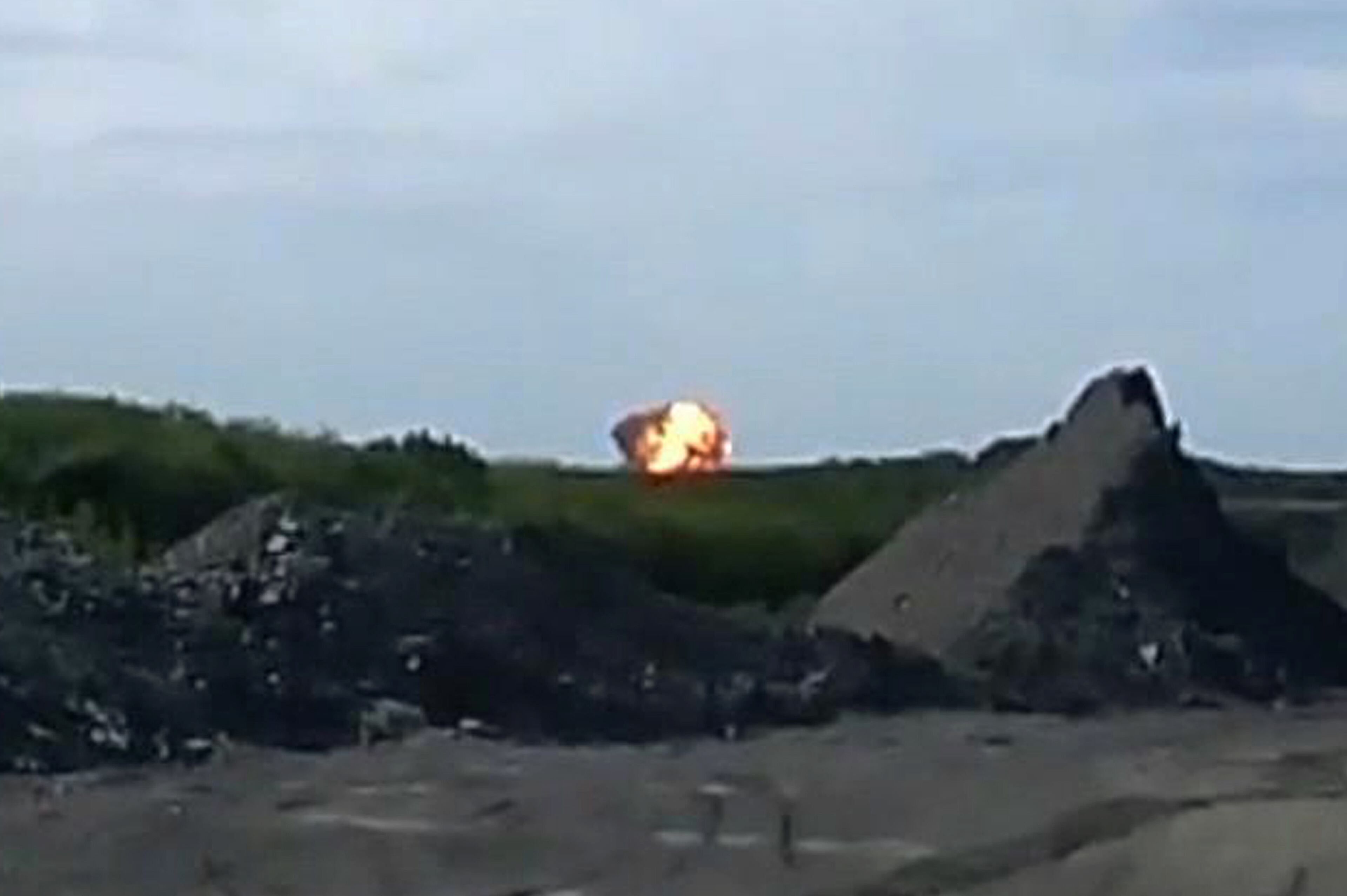 In this image taken from amateur video, Thursday July 17, 2014, a fireball is seen shortly after a Malaysia Airlines passenger plane carrying 295 people was shot down Thursday as it flew over Ukraine, and plumes of black smoke rose up from the scene near the rebel-held village of Grabovo, in eastern Ukraine. Malaysia Airlines has tweeted that it lost contact with one of its flights as it was traveling from Amsterdam to Kuala Lumpur over Ukrainian airspace. (AP Photo / Amateur Video accessed by APTV)