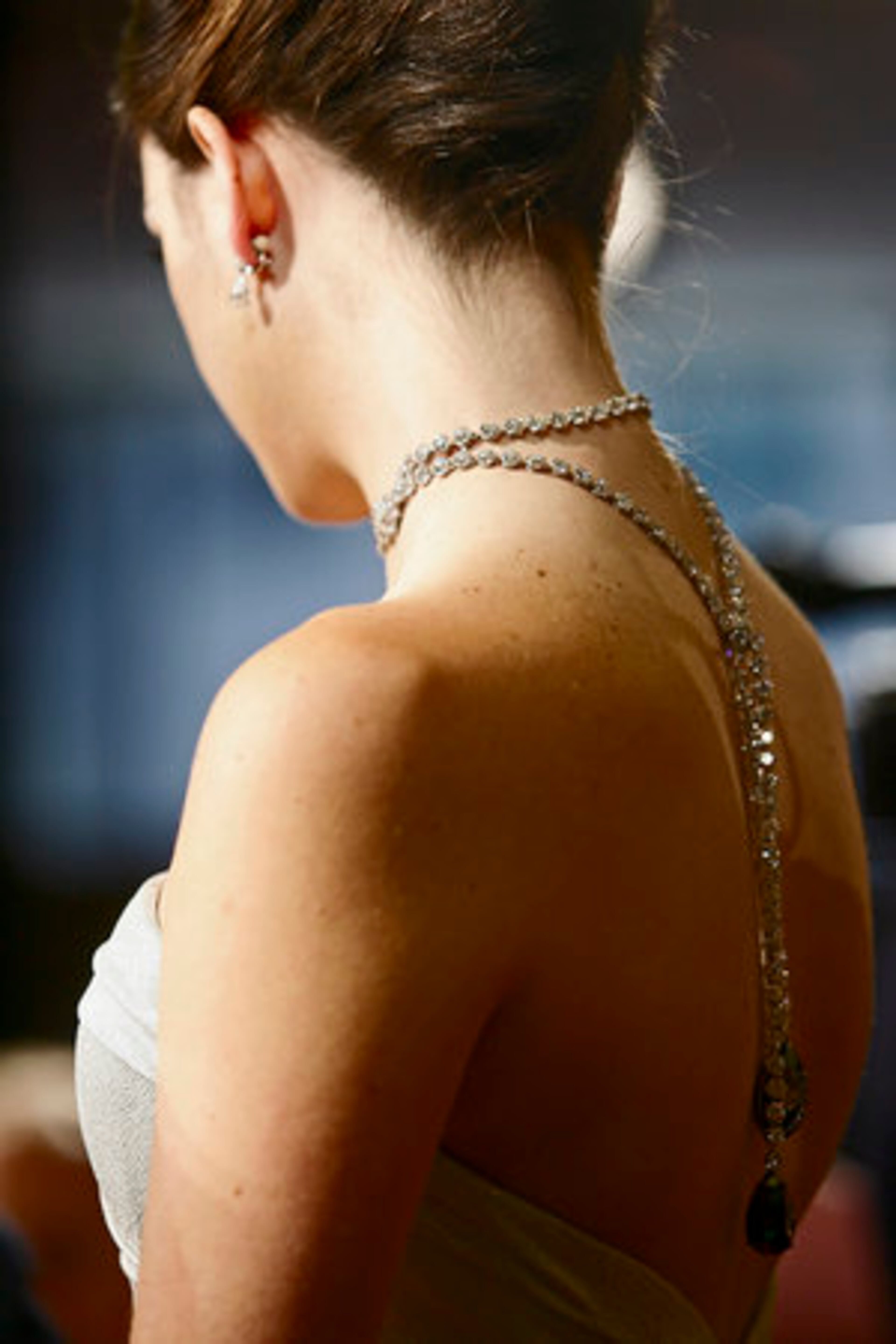 Model Lauren Gish wears Martin Katz jewelry: Lariat with two pear shape black diamonds.