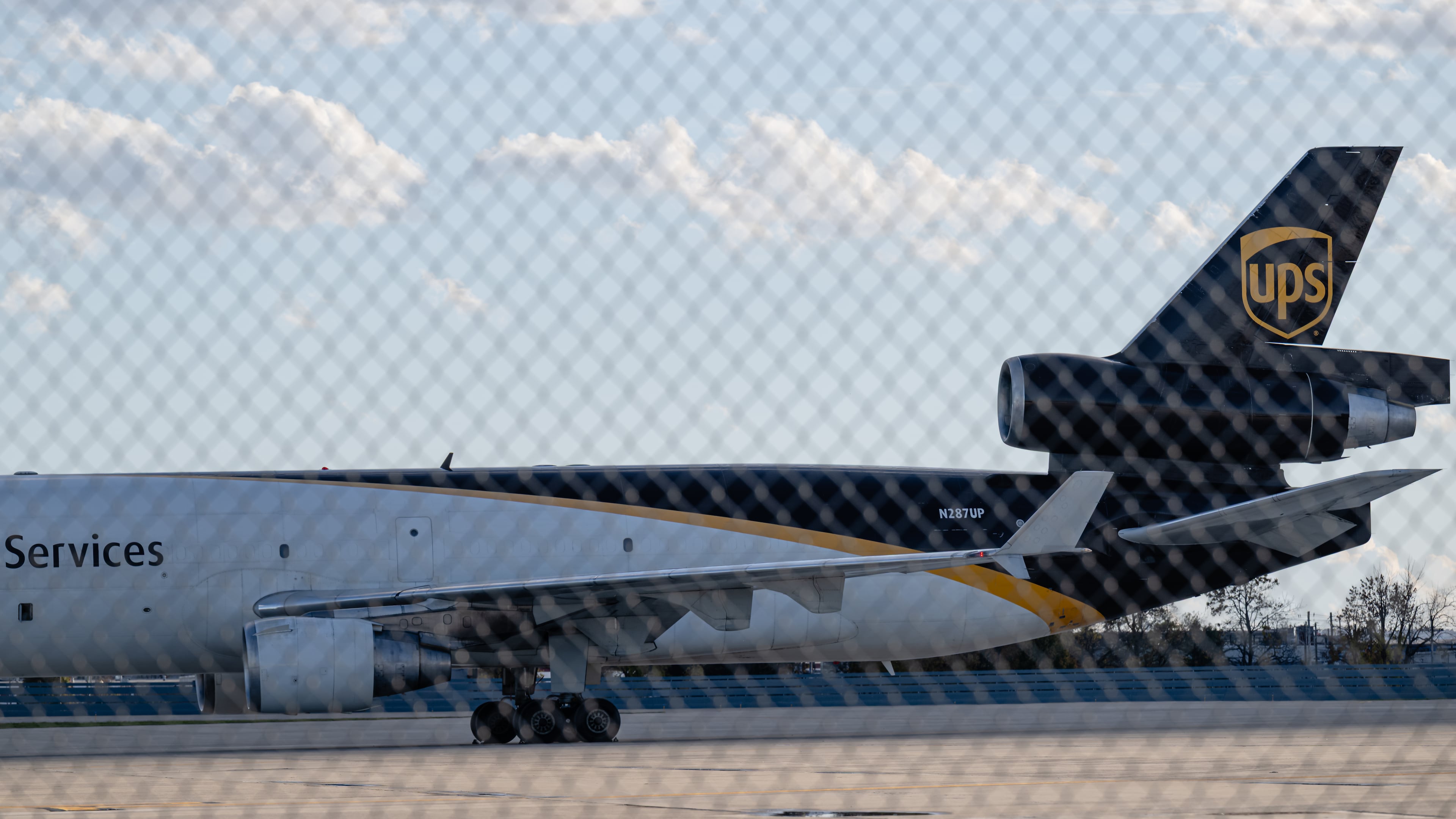 FILE - An MD-11F is seen parked at the UPS North Maintenance Hangar, Nov. 8, 2025, in Louisville, Ky. (AP Photo/Jon Cherry, File)