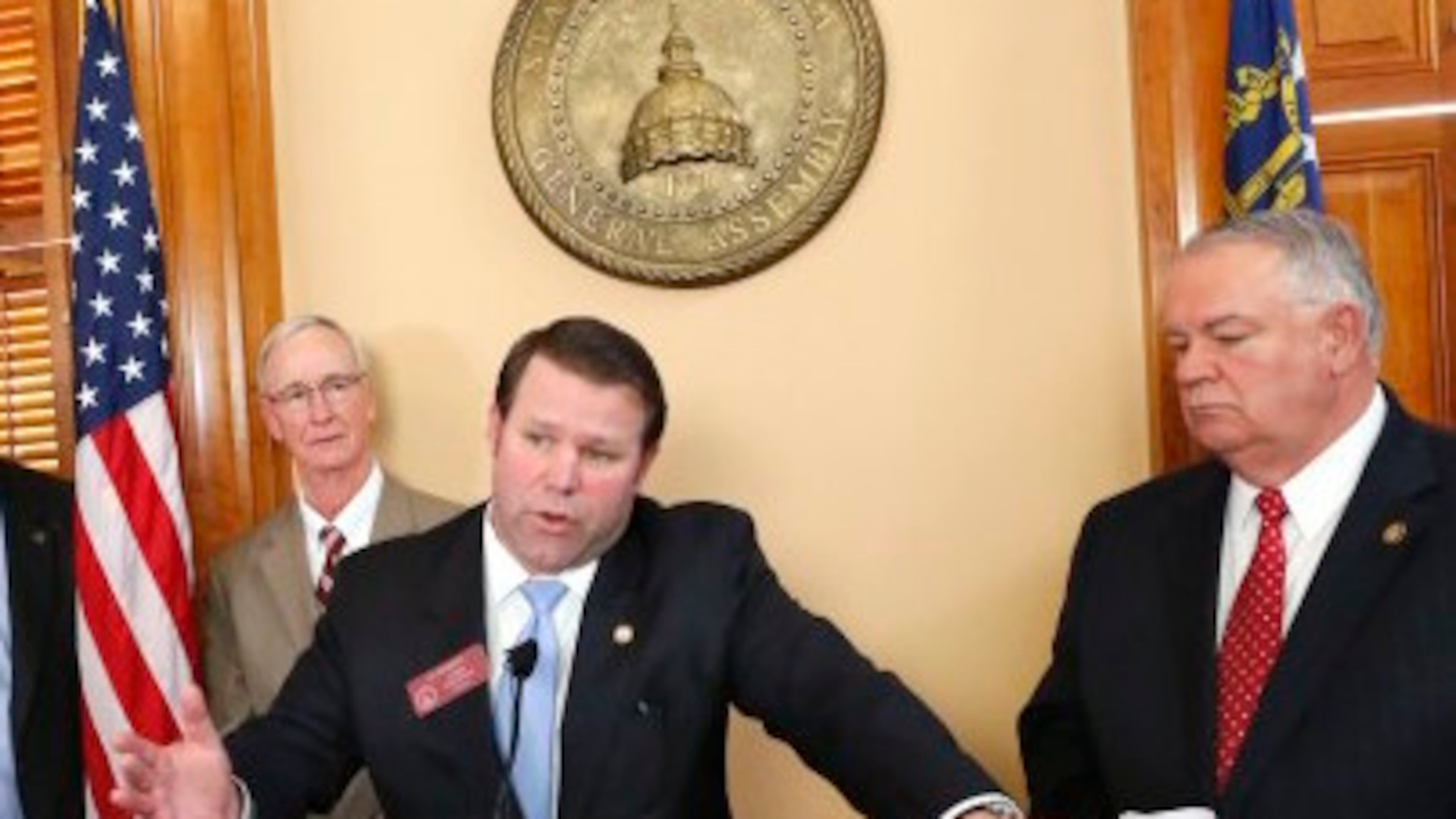 January 28, 2015 - Atlanta - House Transportation Committee Chairman Jay Roberts (at podium) and Speaker David Ralston (right), outlined the transportation plan at a news conference Wednesday afternoon. Behind them is Appropriations Committee Chairman Terry England (left), R - Auburn, Matt Hatchett, R - Dublin and Larry O`Neal, R - Bonaire. Republican leaders in the state House on Wednesday unveiled their plan for funding transportation improvements. Speaker David Ralston, R-Blue Ridge, along with House Transportation Committee Chairman Jay Roberts, R - Ocilla, outlined the plan at a news conference Wednesday afternoon. BOB ANDRES / BANDRES@AJC.COM House Transportation Chair Jay Roberts, center, describes a new transportation funding proposal Wednesday as House Speaker David Ralston, right, and Majority Leader Larry O'Neal look on. BOB ANDRES / BANDRES@AJC.COM