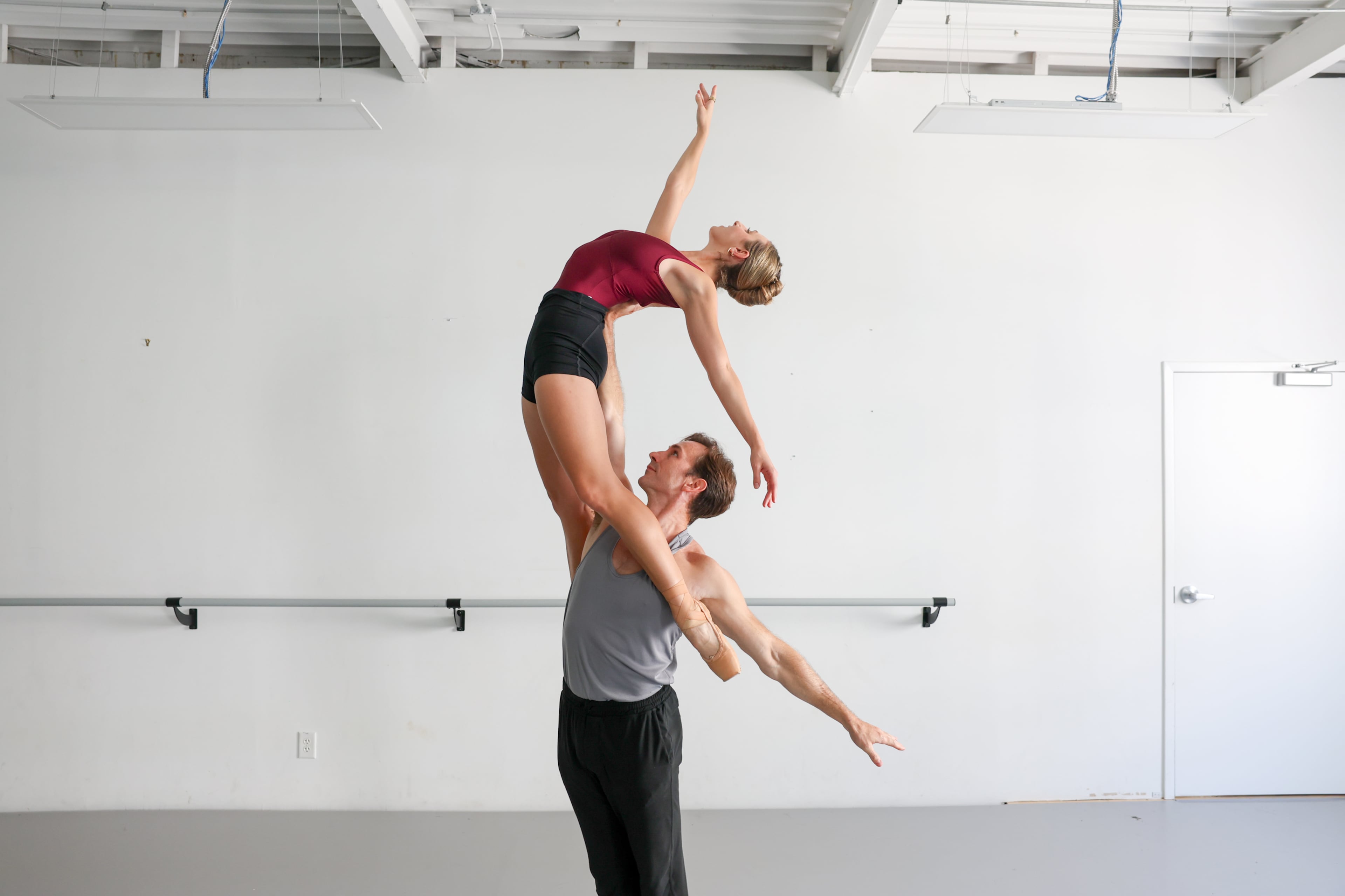 “Partnering with Christian feels like flying,” Terminus dancer Georgia Dalton (top) said of Clark. "… He is so steady and consistent." (Arvin Temkar/AJC)