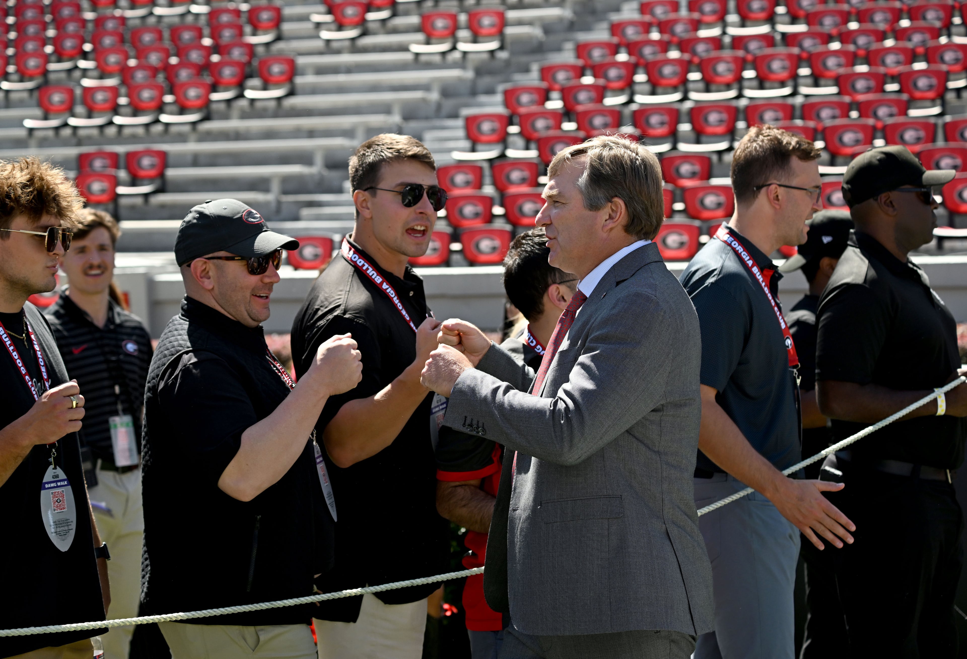Georgia head coach Kirby Smart greets fans during the Dawg Walk before Georgia's SEC football game against Oklahoma at Sanford Stadium, on Saturday, Sept. 26, 2026, in Athens, Ga. (Hyosub Shin/AJC)