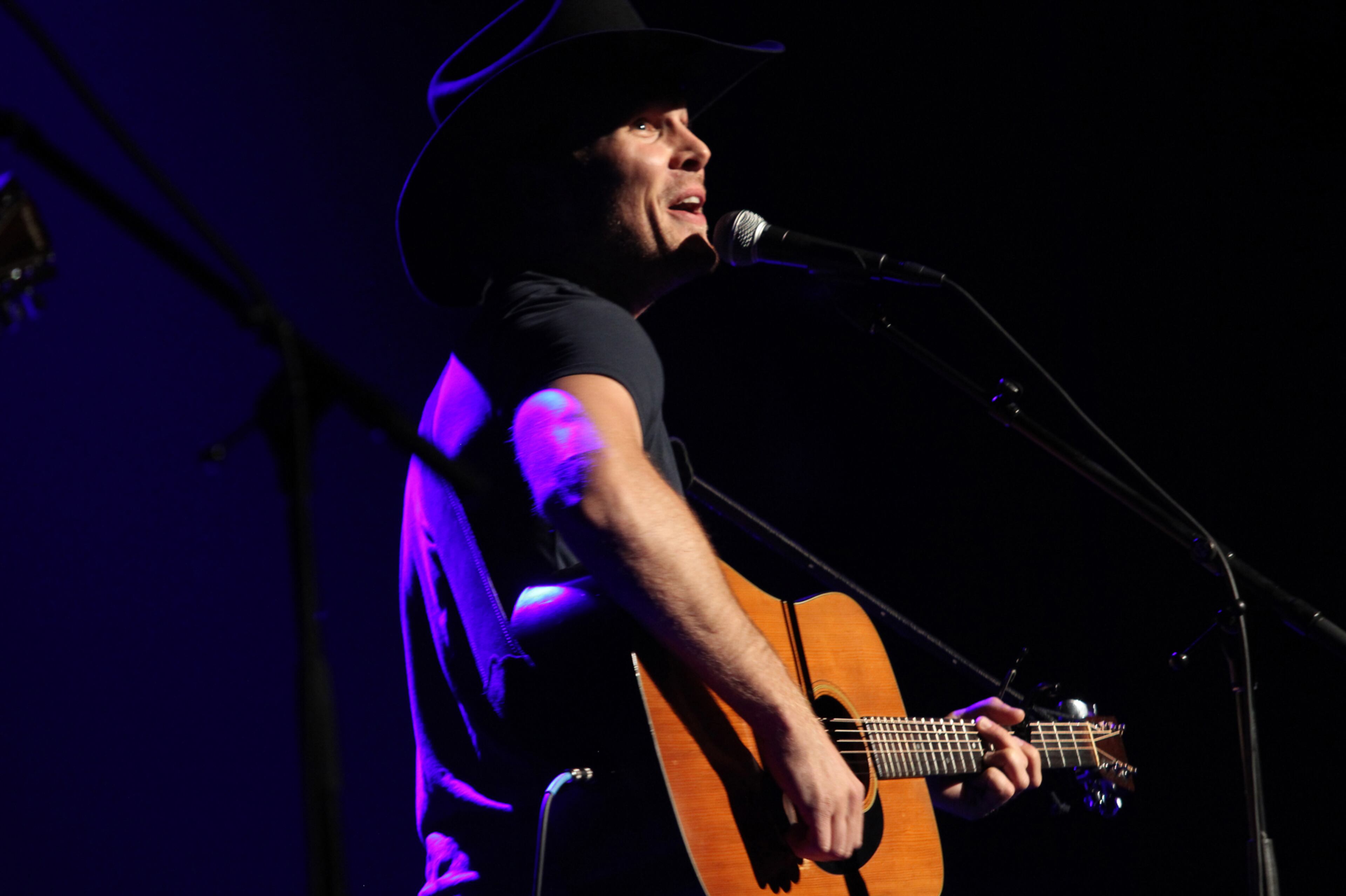 Alabama native and rising country star Aaron Parker opened for legendary country and southern rock band Alabama, sings his hit single, "Anything Alabama" at the Fox Theatre.
