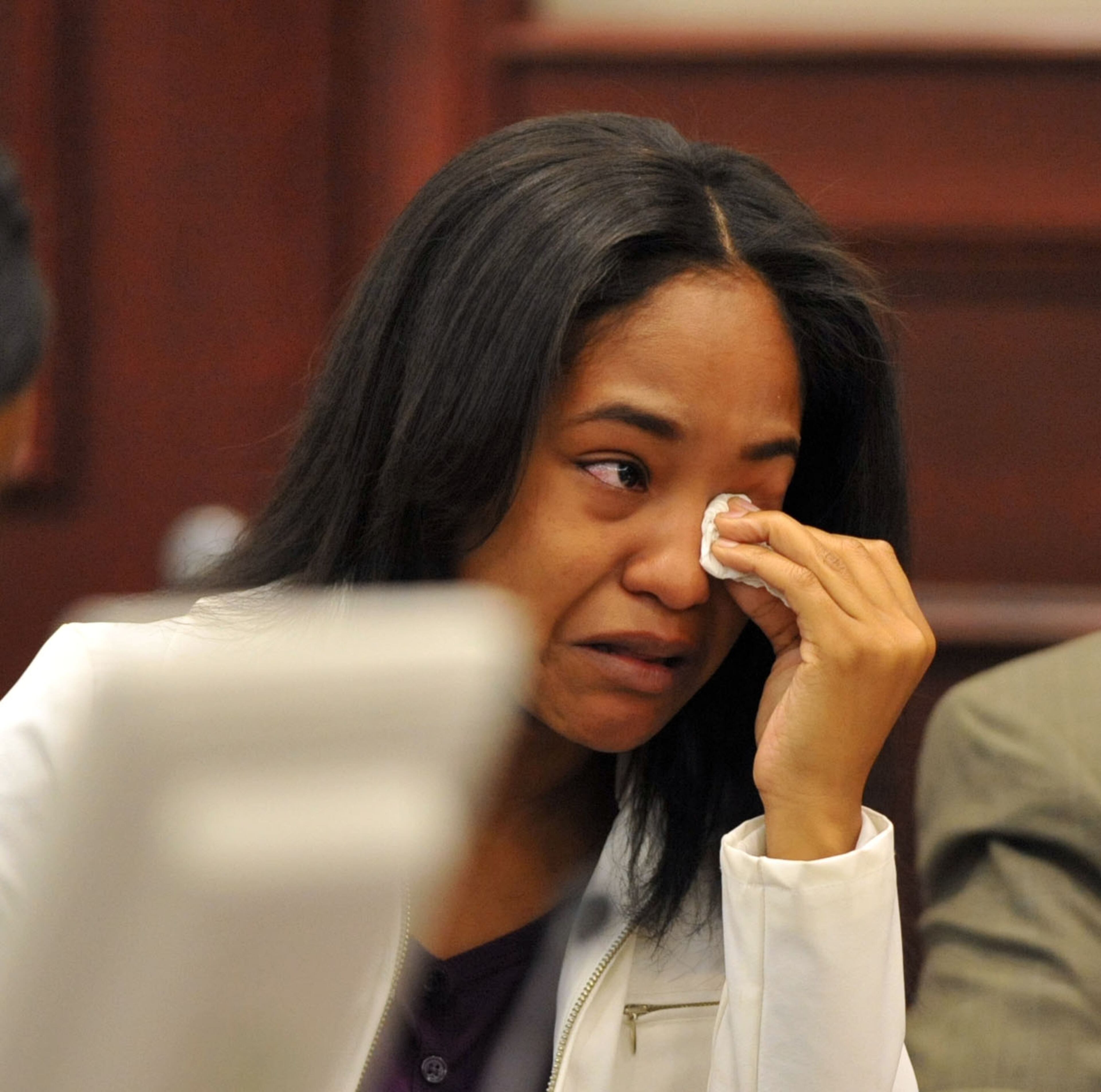 Fallings' daughter, Quantabia Shantell Hopkins (above), a teacher at the school, was sentenced to 30 days in the Clayton County Jail and then almost 10 years probation for two counts of involuntary manslaughter, reckless conduct and contributing to the deprivation of a child, two-year-old Jazmin Green, who died after being left behind in a van, strapped in a car seat almost three years ago.
