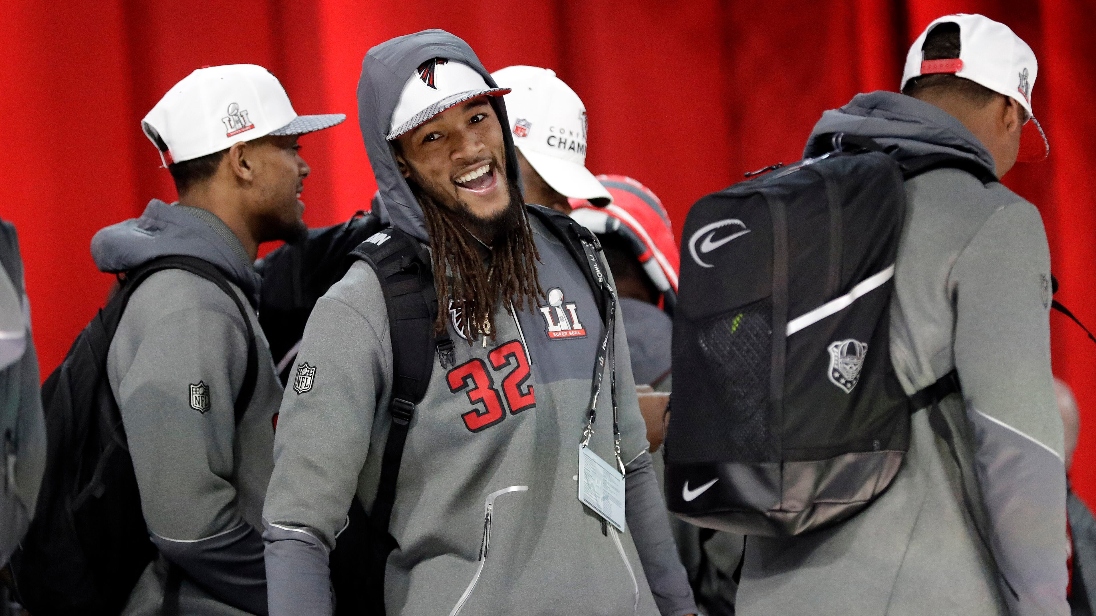 Atlanta Falcons' Jalen Collins has some fun during opening night for the NFL Super Bowl 51 football game at Minute Maid Park Monday, Jan. 30, 2017, in Houston. (AP Photo/David J. Phillip)