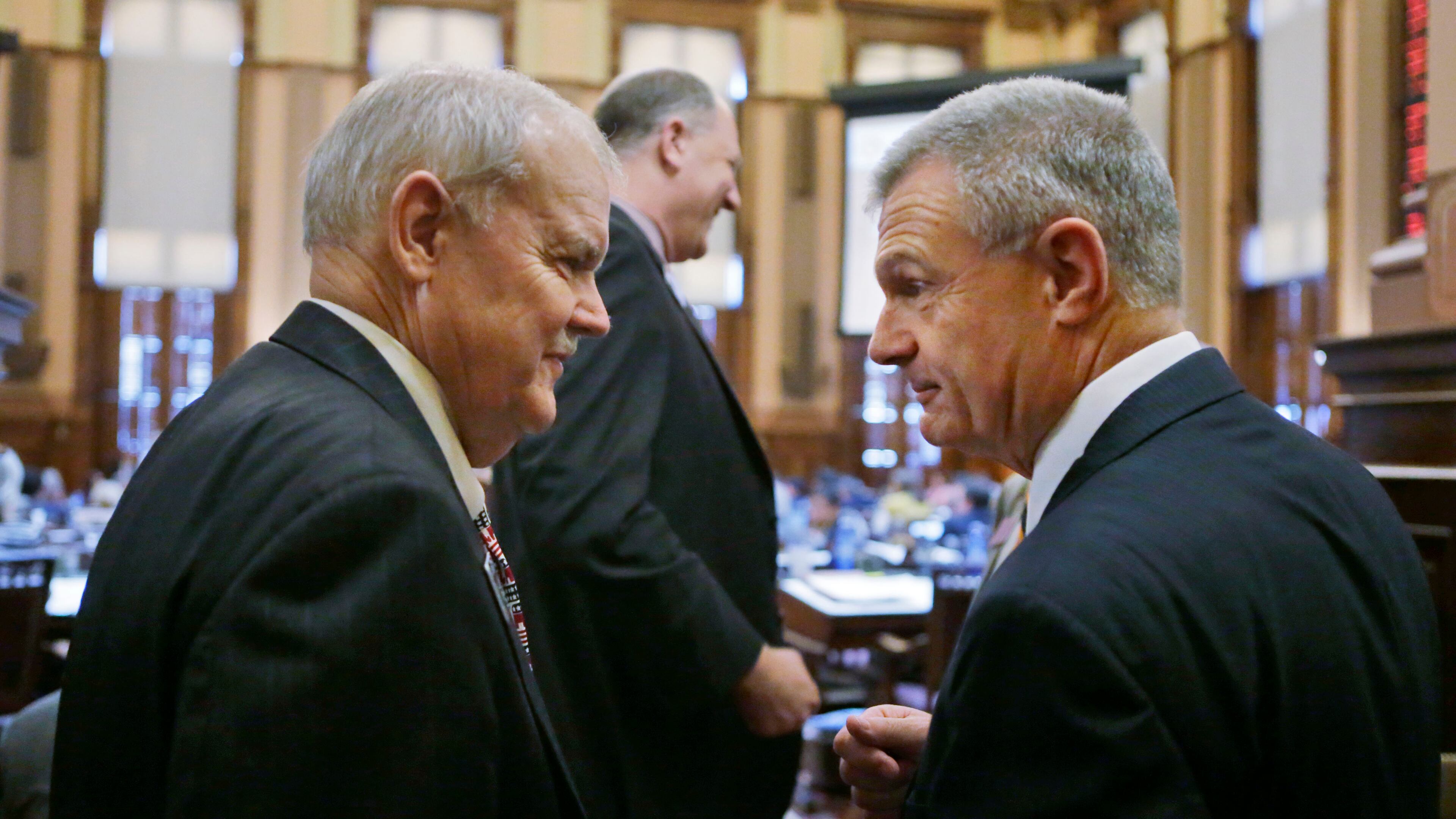 Rep. Randy Nix (right), R - LaGrange, who carried the bill in the House, confers with Sen. Lindsey Tippins, R-Marietta, who sponsored the bill, after it's passage. Senate Bill 364 passed the House Tuesday. It is the biggest education-related bill of this legislative session. It cuts back on testing and the use of tests in teacher evaluations, affecting more than 100,000 teachers and 1.7 million Georgia students. BOB ANDRES / BANDRES@AJC.COM