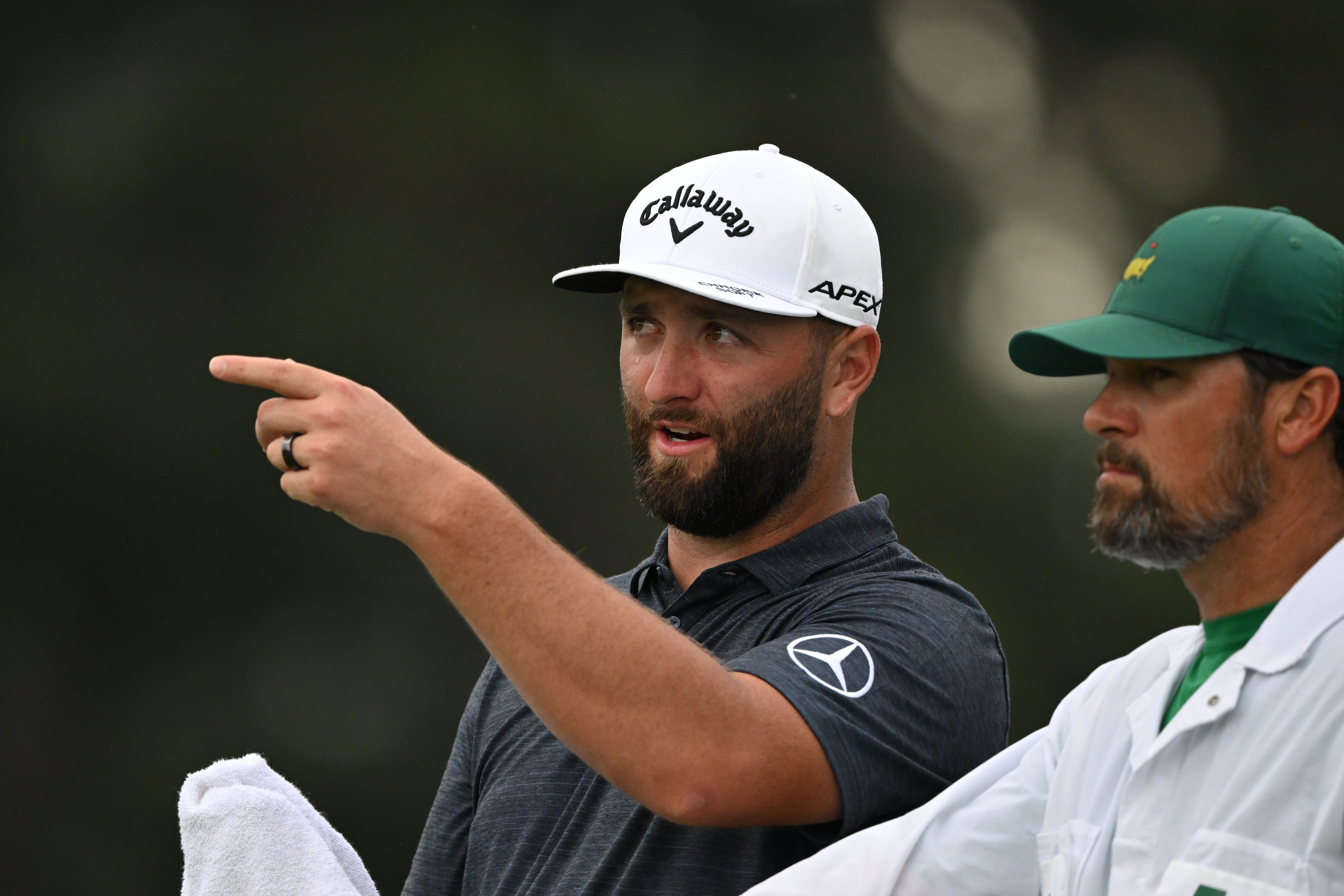 Jon Rahm with caddie Adam Hayes on the 17th hole during first round of the 2023 Masters Tournament at Augusta National Golf Club, Thursday, April 6, 2023, in Augusta, Ga. (Hyosub Shin / Hyosub.Shin@ajc.com)