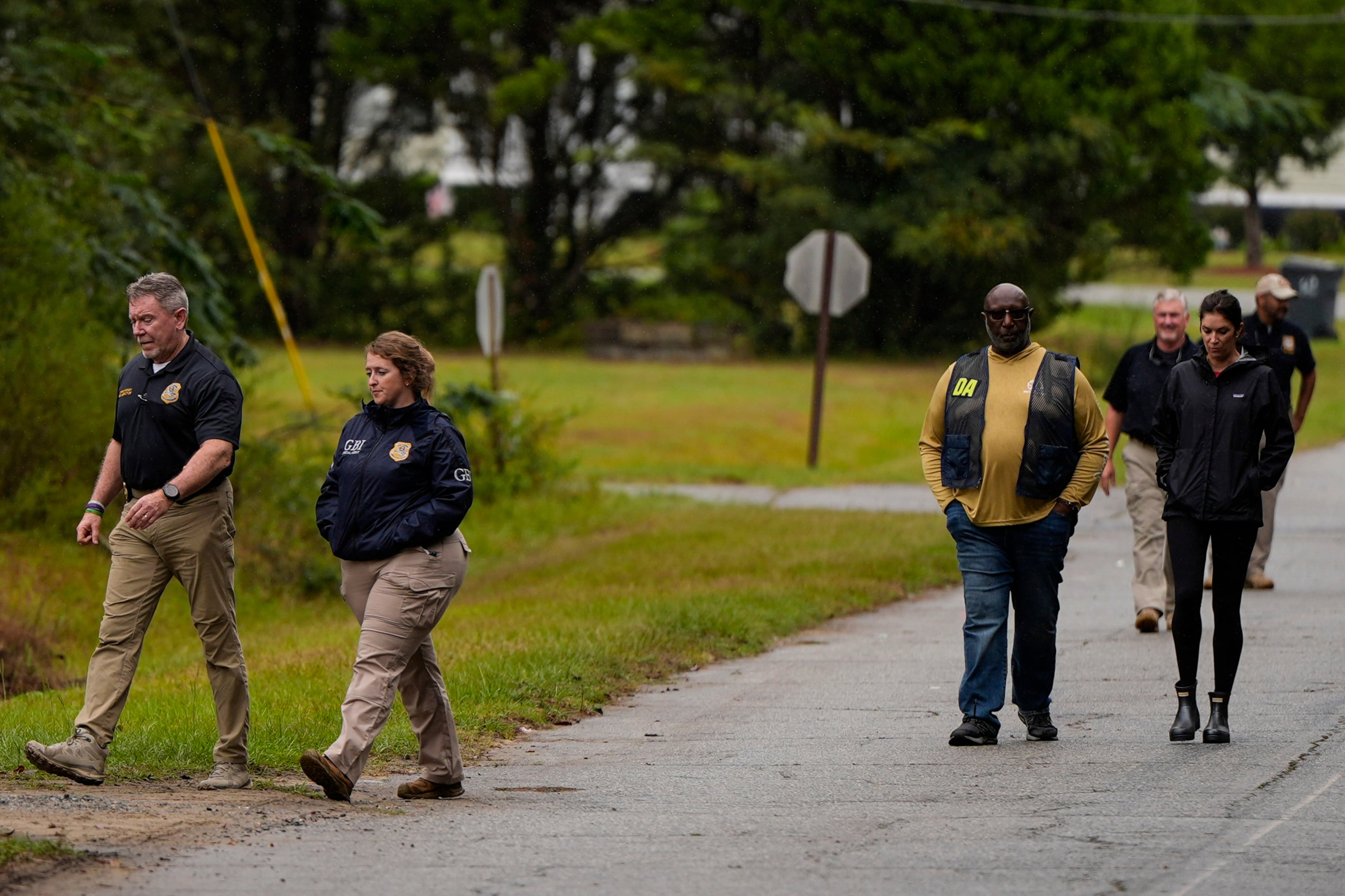 Authorities on Sunday investigate the scene of a mass shooting where at least two people died and 35 were injured in Vienna, Georgia. (Mike Stewart/AP)