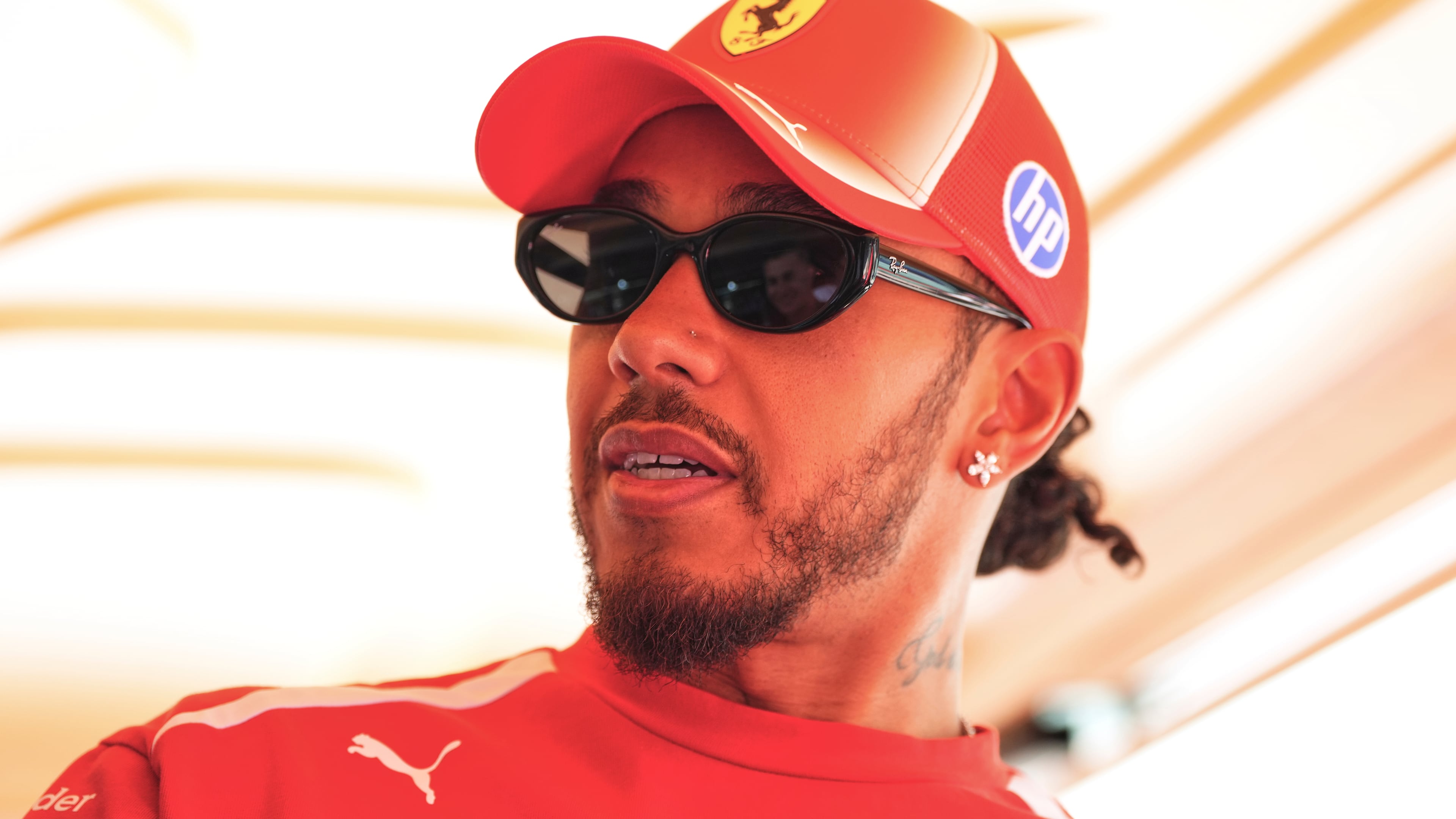 Ferrari driver Lewis Hamilton of Britain is pictured in the paddock ahead the Spanish Formula One Grand Prix, in Madrid, Spain, Thursday, Sept. 10, 2026. (AP Photo/Manu Fernandez)