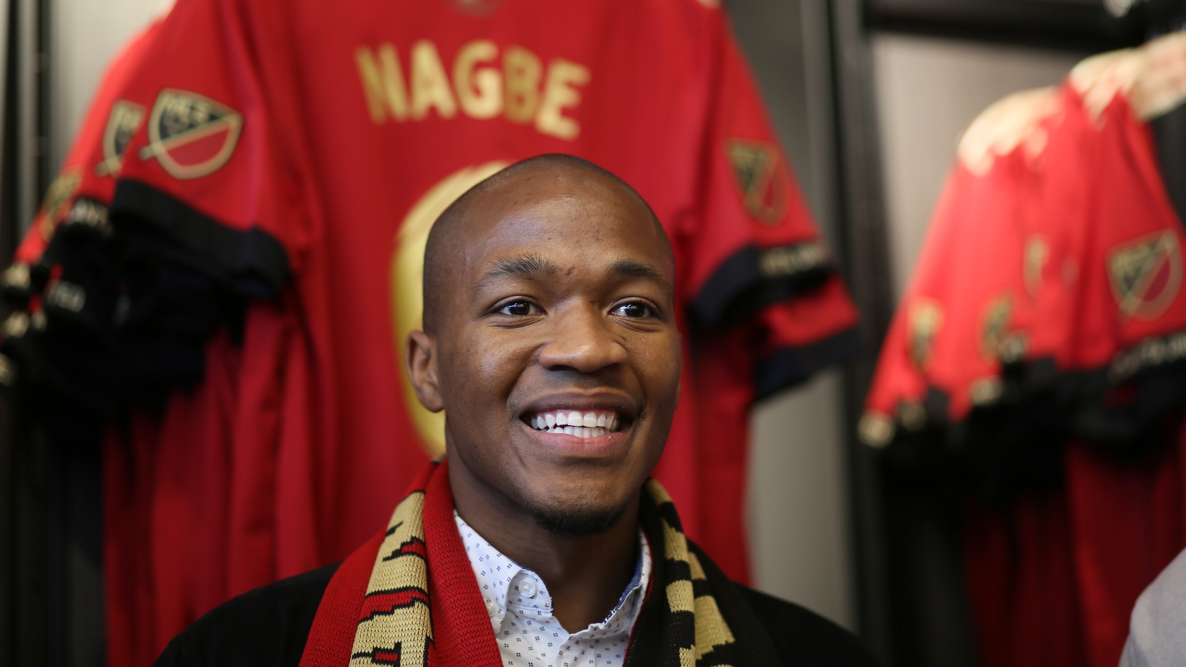 December 15 , 2017-Atlanta.Atlanta United midfielder Darlington Nagbe smiles during the warm welcome he received at at Mercedes-Benz Stadium on Friday, December 15.