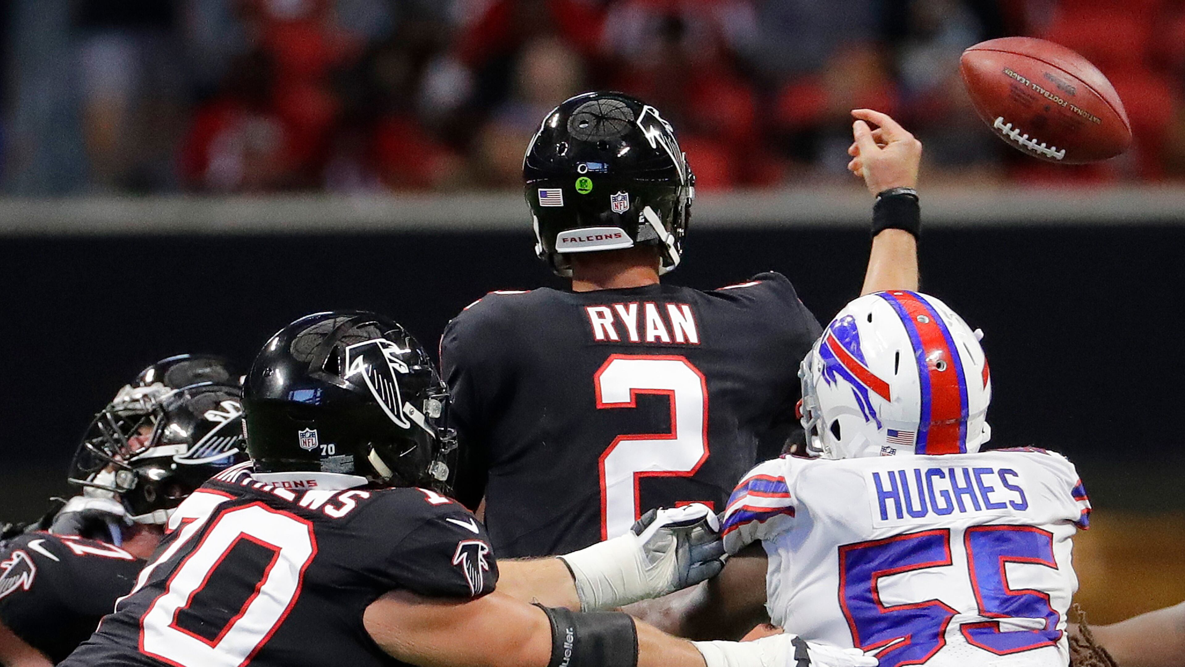 Buffalo Bills defensive end Jerry Hughes (55) hits Atlanta Falcons quarterback Matt Ryan (2) causing Ryan to fumble during the second half of an NFL football game, Sunday, Oct. 1, 2017, in Atlanta. Buffalo Bills cornerback Tre'Davious White picked up the ball and scored a touchdown. (AP Photo/David Goldman)