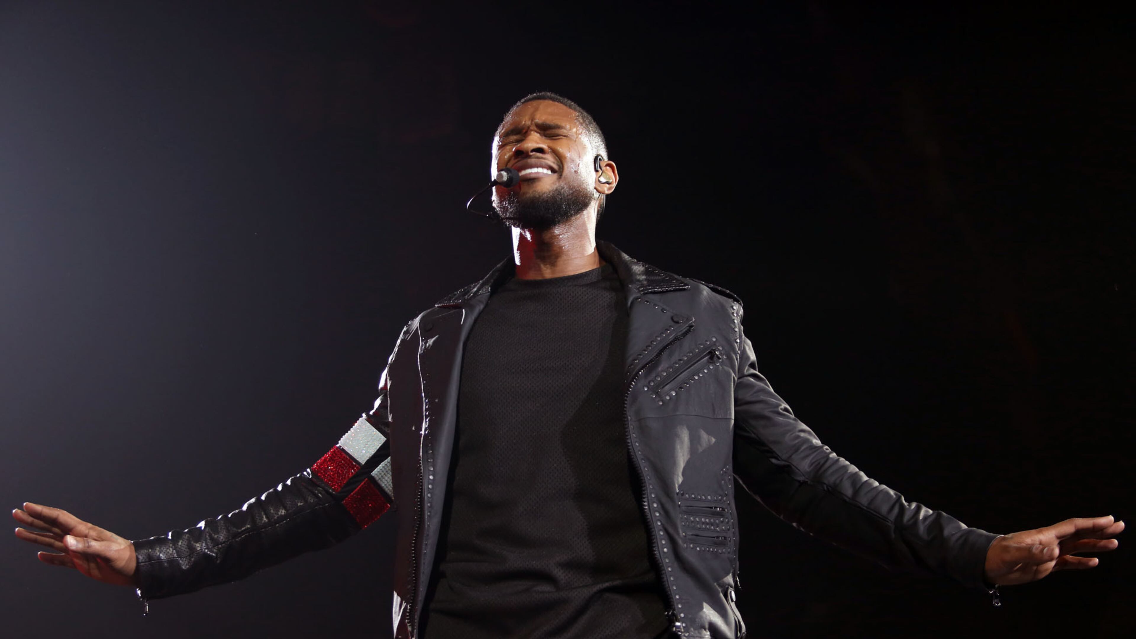Usher, seen here during a December concert at Philips Arena, has filed for a protective order against a woman who has allegedly stalked him for years. (Akili-Casundria Ramsess/Special to the AJC )
