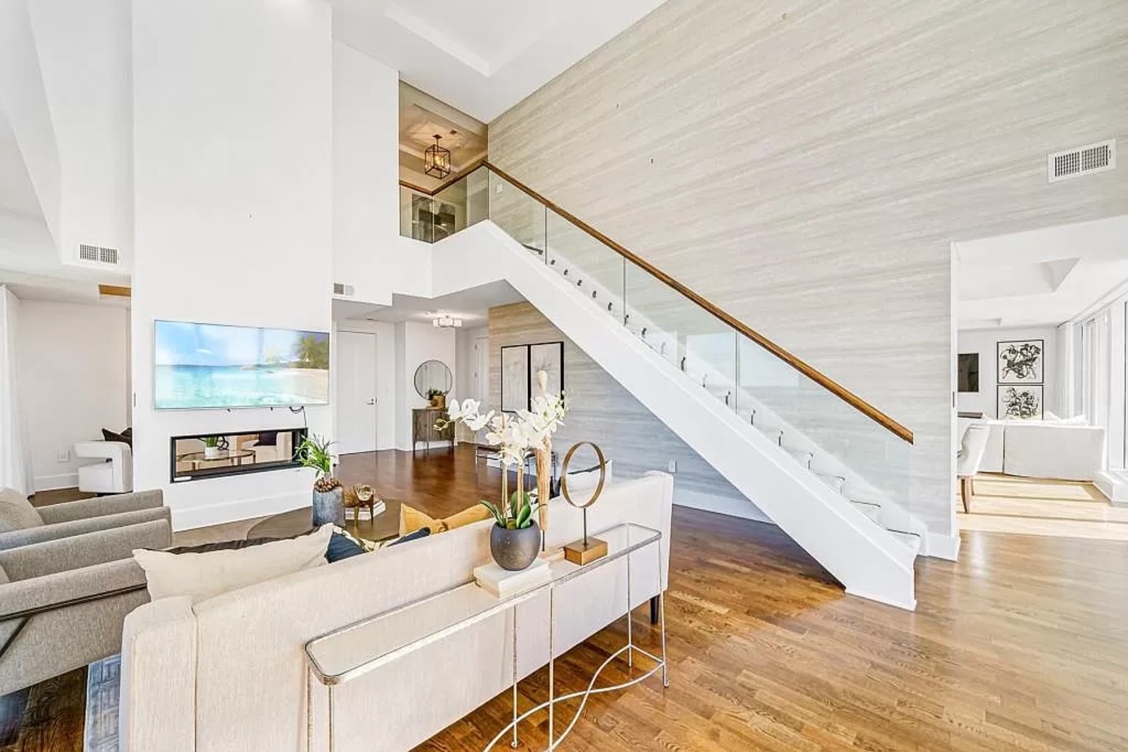 Use the elevator or the mistral glass-lined staircase, featured on the cover of BuckHaven magazine, to access the second level’s sleeping quarters, including a guest suite and a sprawling primary suite.