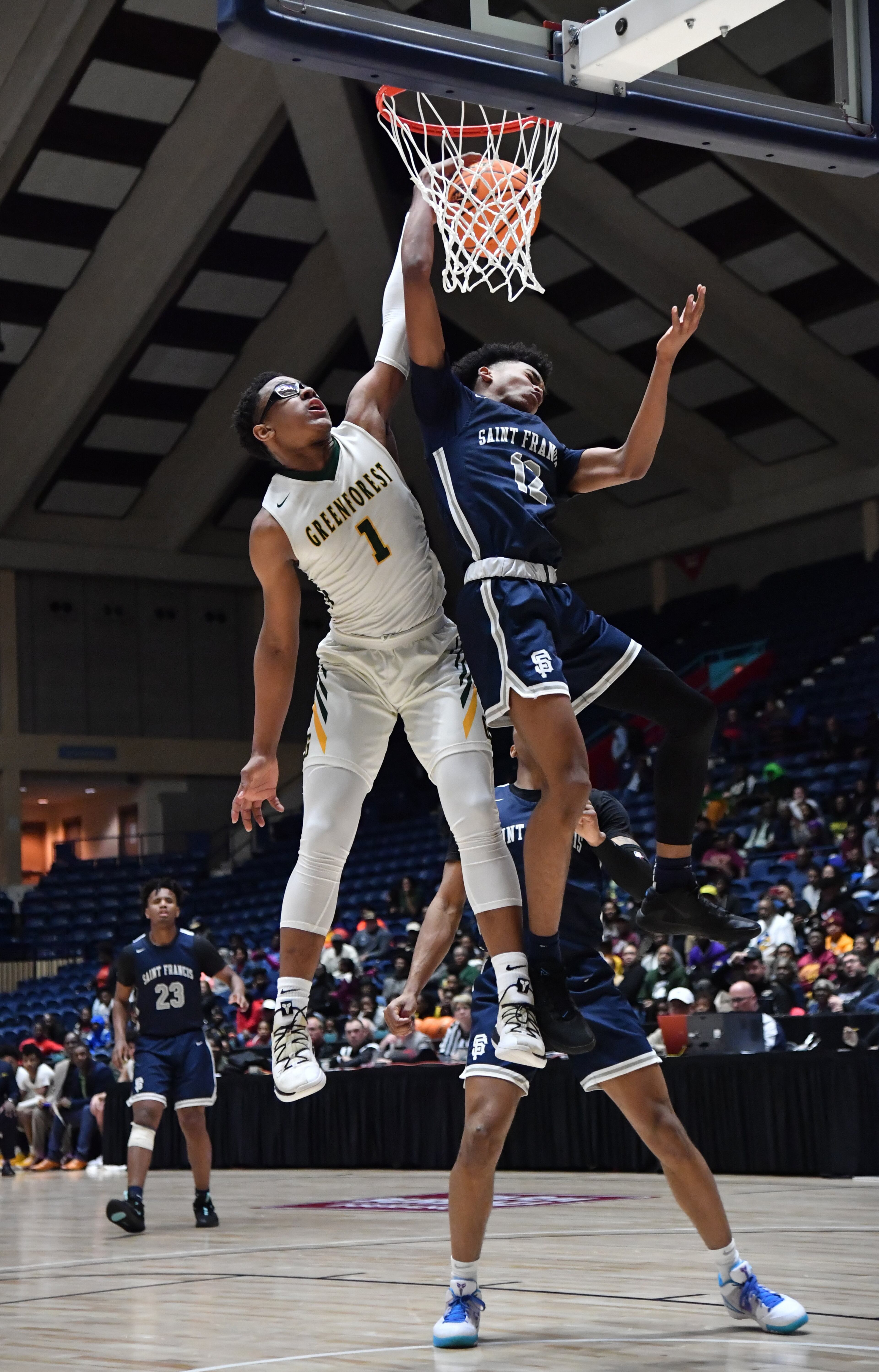 Greenforest's Jalen Forrest (1) and St. Francis' Seth Hubbard (12) fight for a rebound. (Hyosub Shin / Hyosub.Shin@ajc.com)