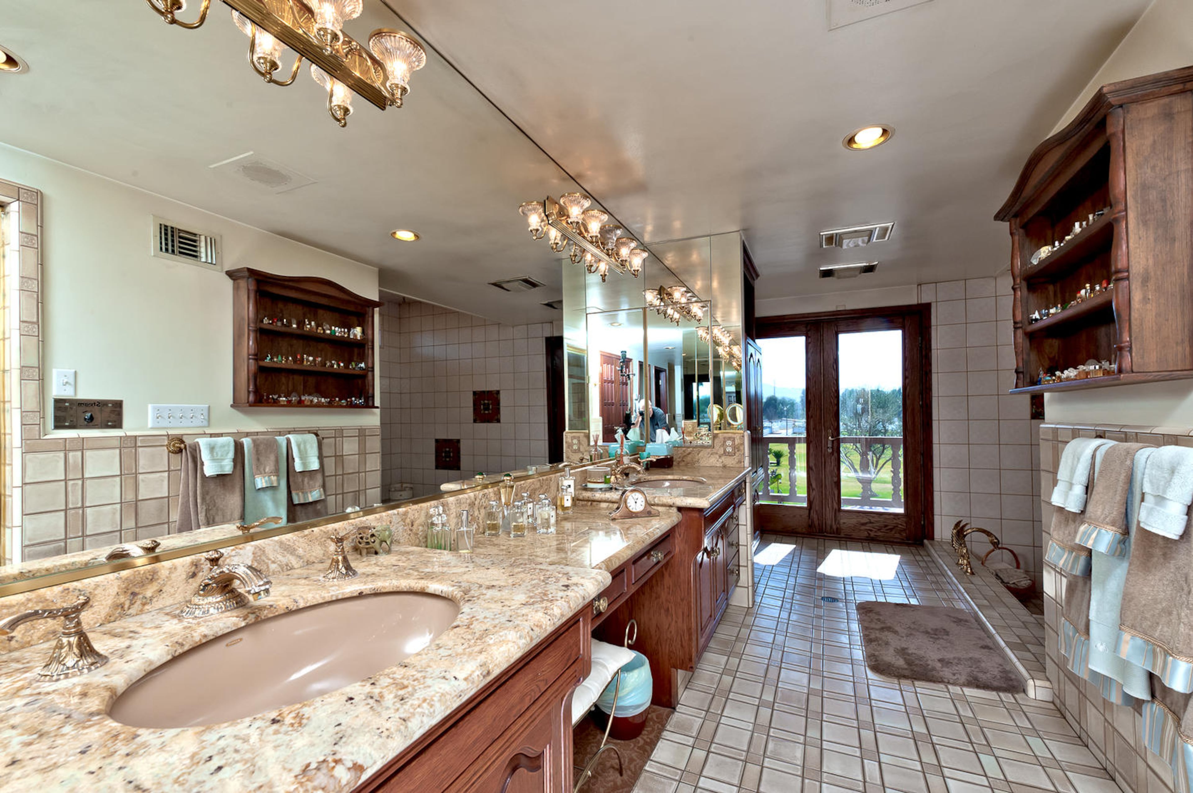 The Temecula, Calif., estate of "Odd Couple" star Jack Klugman, who passed away in 2012, recently sold for $6 million. The 8,920-square-foot Spanish-style home has five bedrooms, eight full baths, vaulted ceilings and a large curved staircase. The property also includes four guest homes, a five-hole golf course, a pool and cabana, a koi pond, a vet clinic, barns, two horse-riding arenas and multiple stalls. For more information, visit http://www.toptenrealestatedeals.com/homes/weekly-ten-best-home-deals/2013/7-16-2013/.