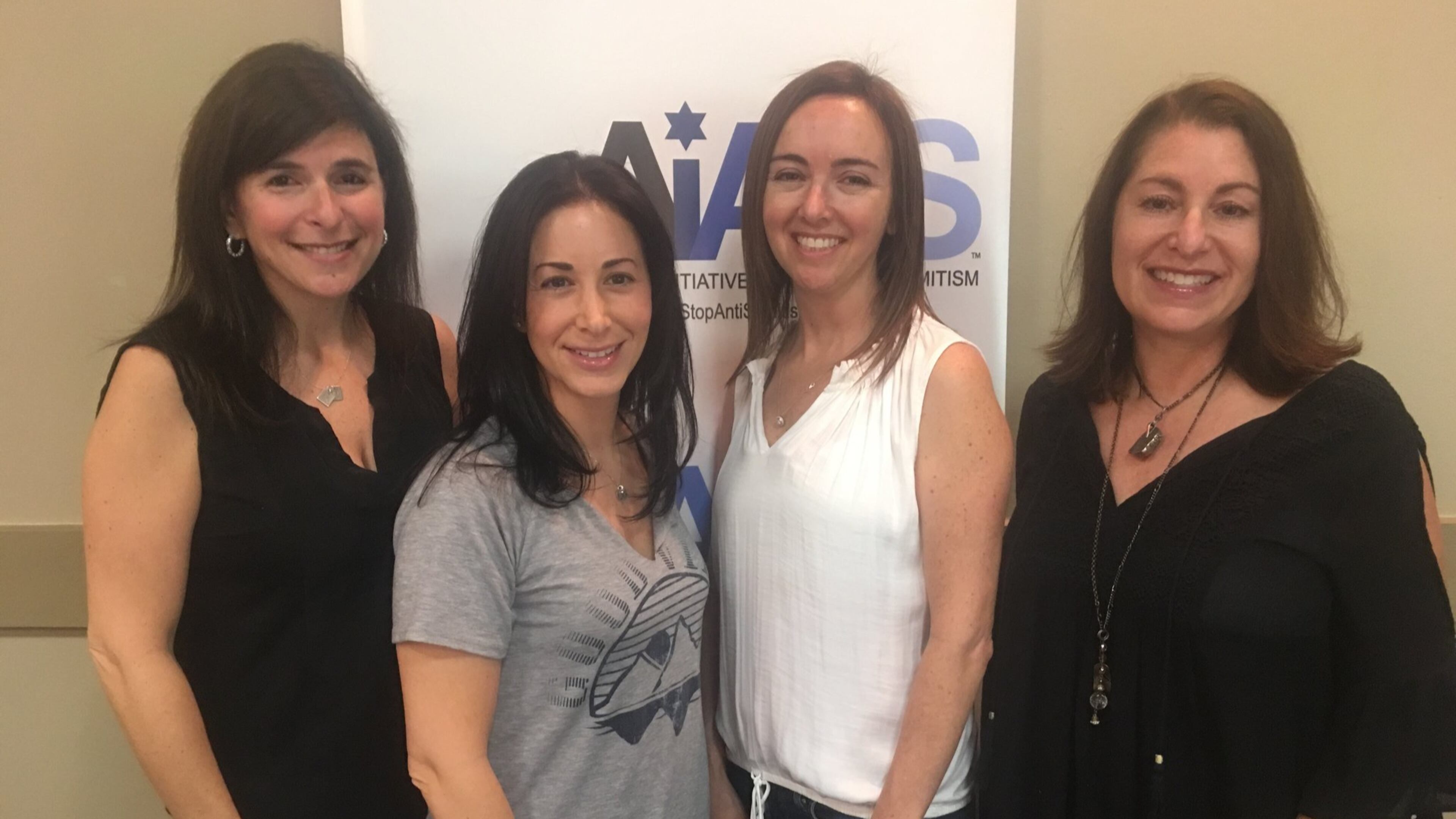 Lauren Menis (second from right) is pictured with Lisa Freedman, Danielle Cohen and Hildee Isaacs. Menis, a stay-at-home mom from Dunwoody, is leading a charge to stamp out racial and ethnic hatred. CONTRIBUTED