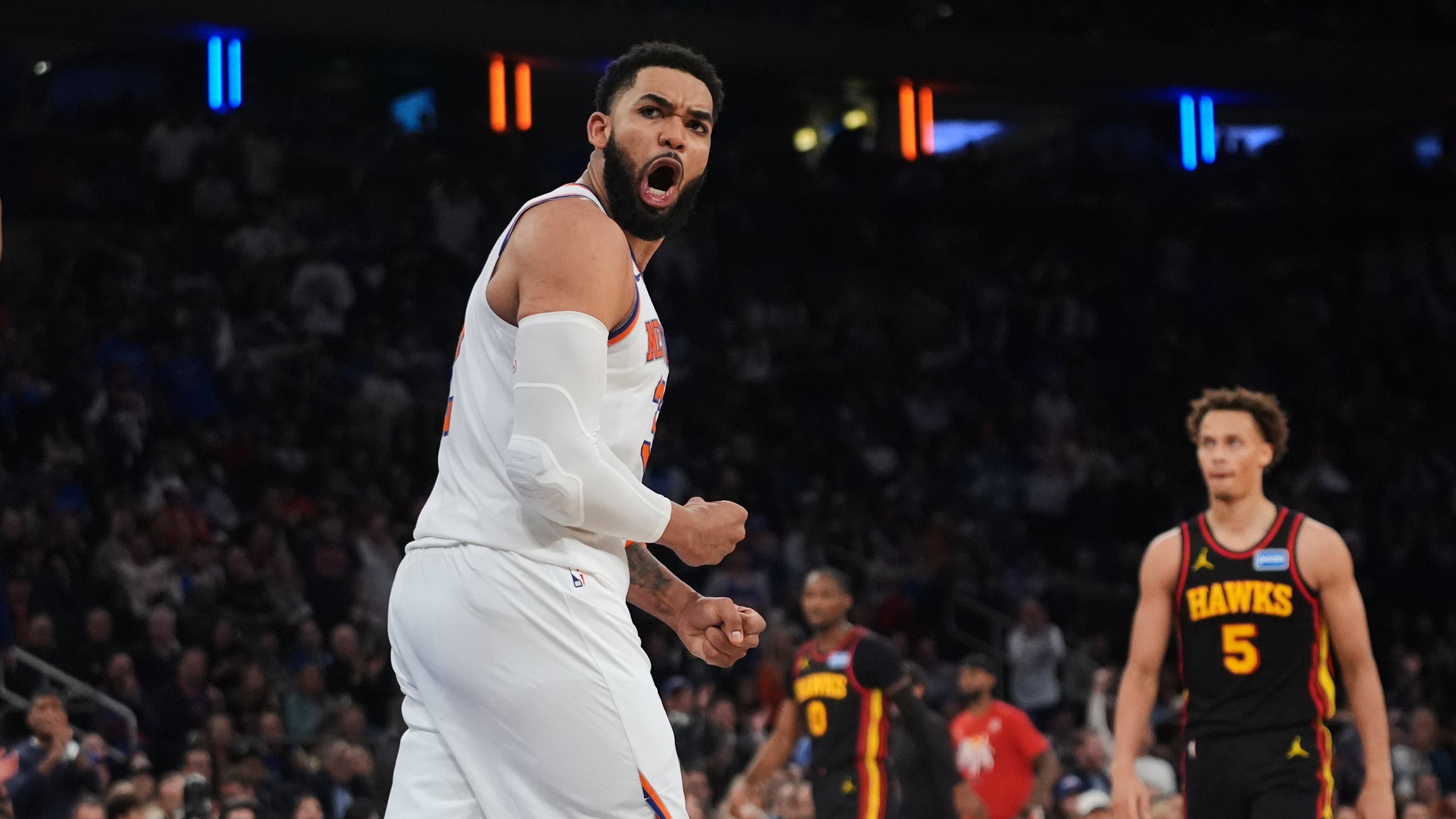 New York Knicks' Karl-Anthony Towns celebrates during the second half in Game 1 of a first-round NBA playoffs basketball series against the Atlanta Hawks, Saturday, April 18, 2026, in New York. (AP Photo/Frank Franklin II)
