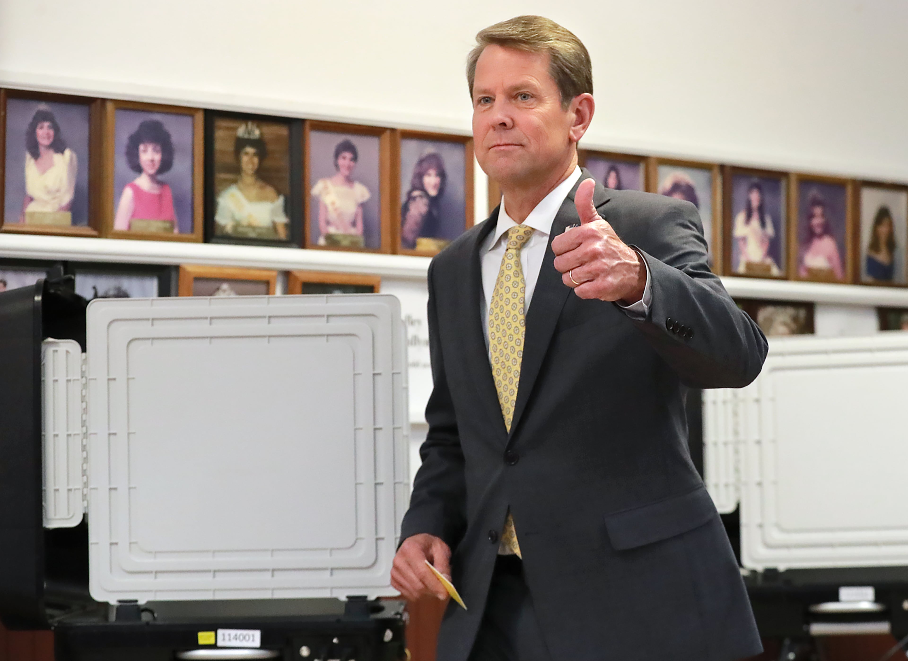 Secretary of State Brian Kemp gives a thumbs up after casting his ballot while voting with his wife Marty at the Winterville Train Depot in the runoff election on Tuesday, July 24, 2018, in Winterville. Kemp is in a runoff with Lt. Governor Casey Cagle after more than a year of bitter GOP infighting over who is the best conservative candidate for governor. Curtis Compton/ccompton@ajc.com