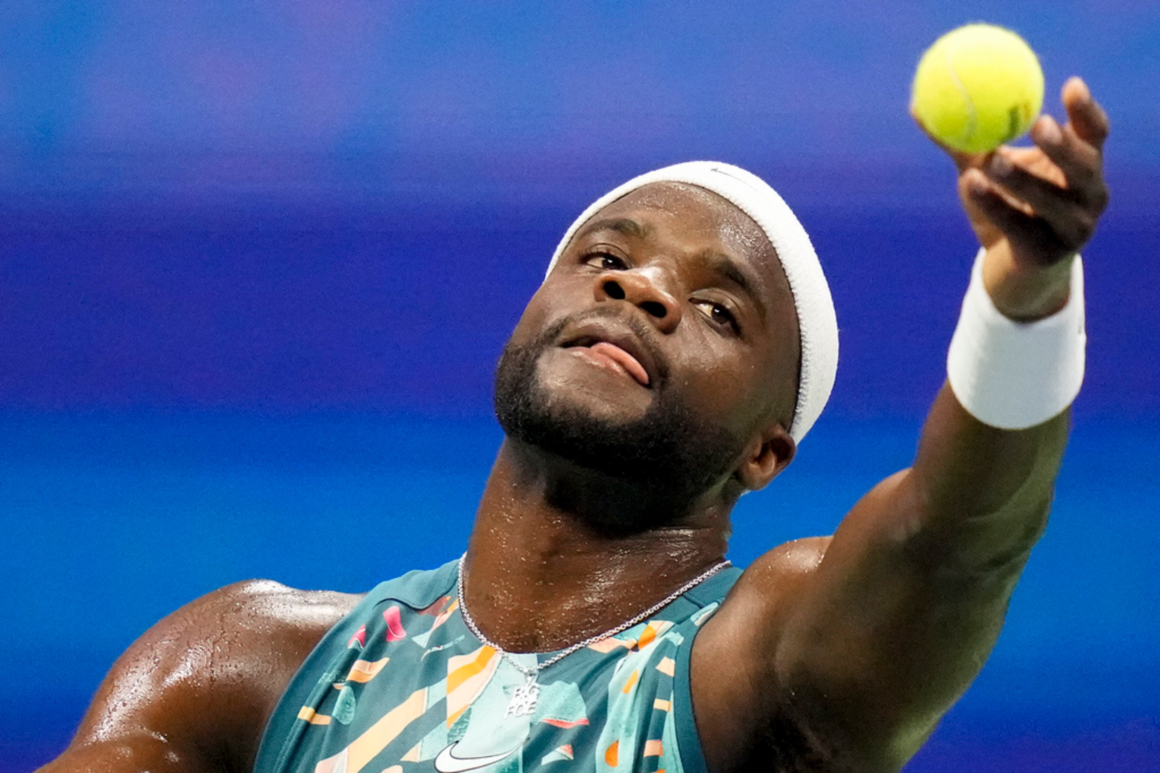 Frances Tiafoe, of the United States, serves to Ben Shelton, of the United States, during the quarterfinals of the U.S. Open tennis championships, Tuesday, Sept. 5, 2023, in New York. (AP Photo/Charles Krupa)