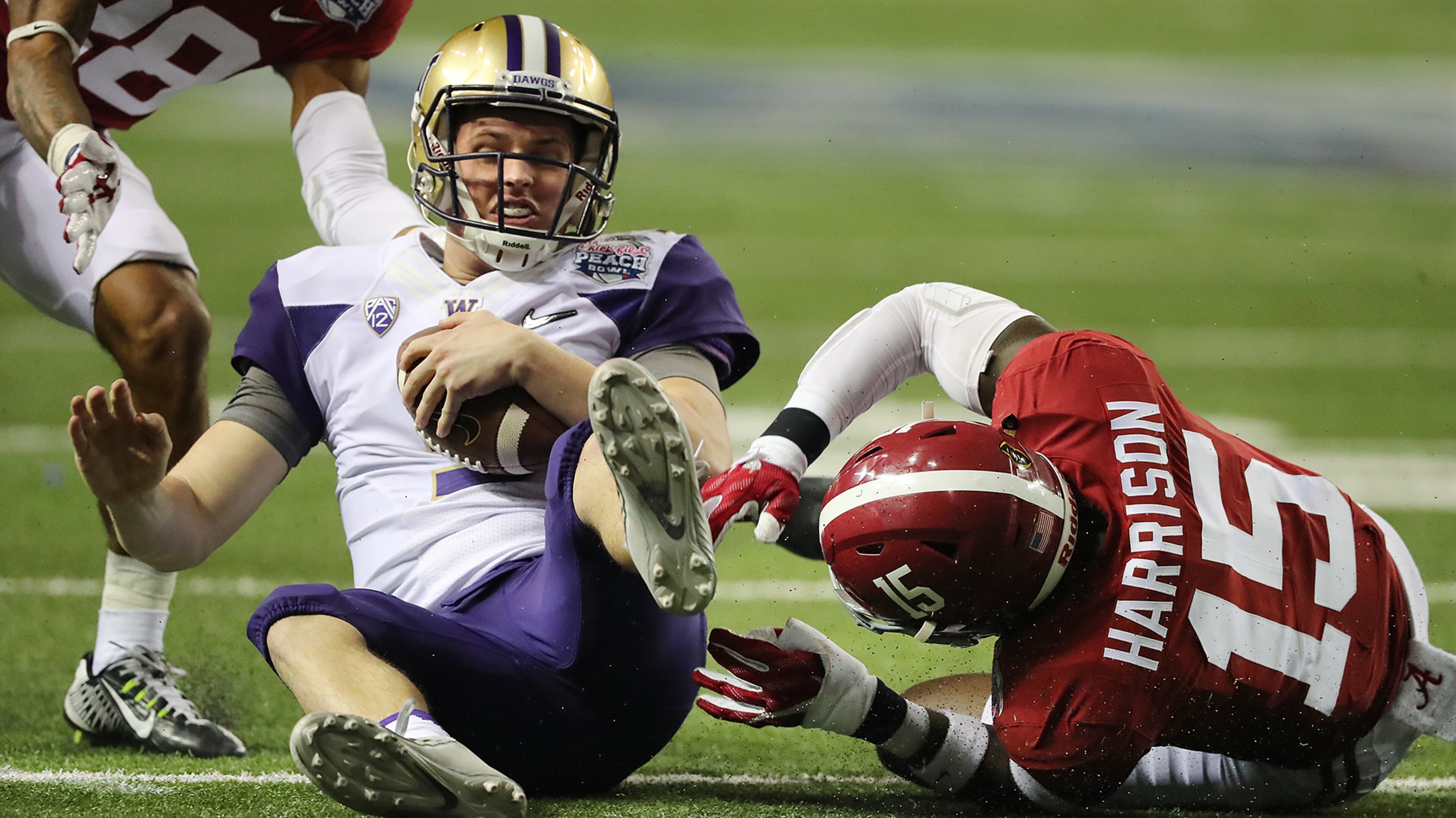 Washington quarterback Jake Browning, shown during a College Football Playoff semifinal game in the Chick-fil-A Peach Bowl in 2016, will return to Atlanta to play Auburn in the Chick-fil-A Kickoff on Sept. 1.