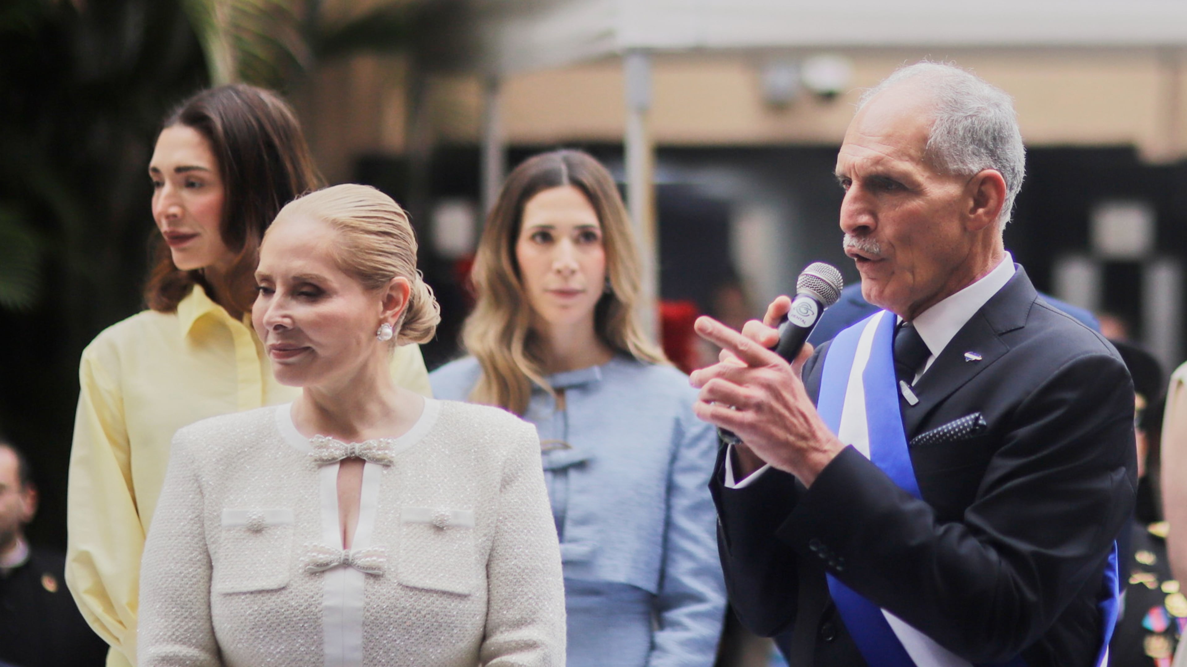Honduran President Nasry Asfura speaks next to his wife, first lady Lissette del Cid, after his inauguration ceremony as they leave Congress in Tegucigalpa, Honduras, Tuesday, Jan. 27, 2026. (AP Photo/Fernando Destephen)