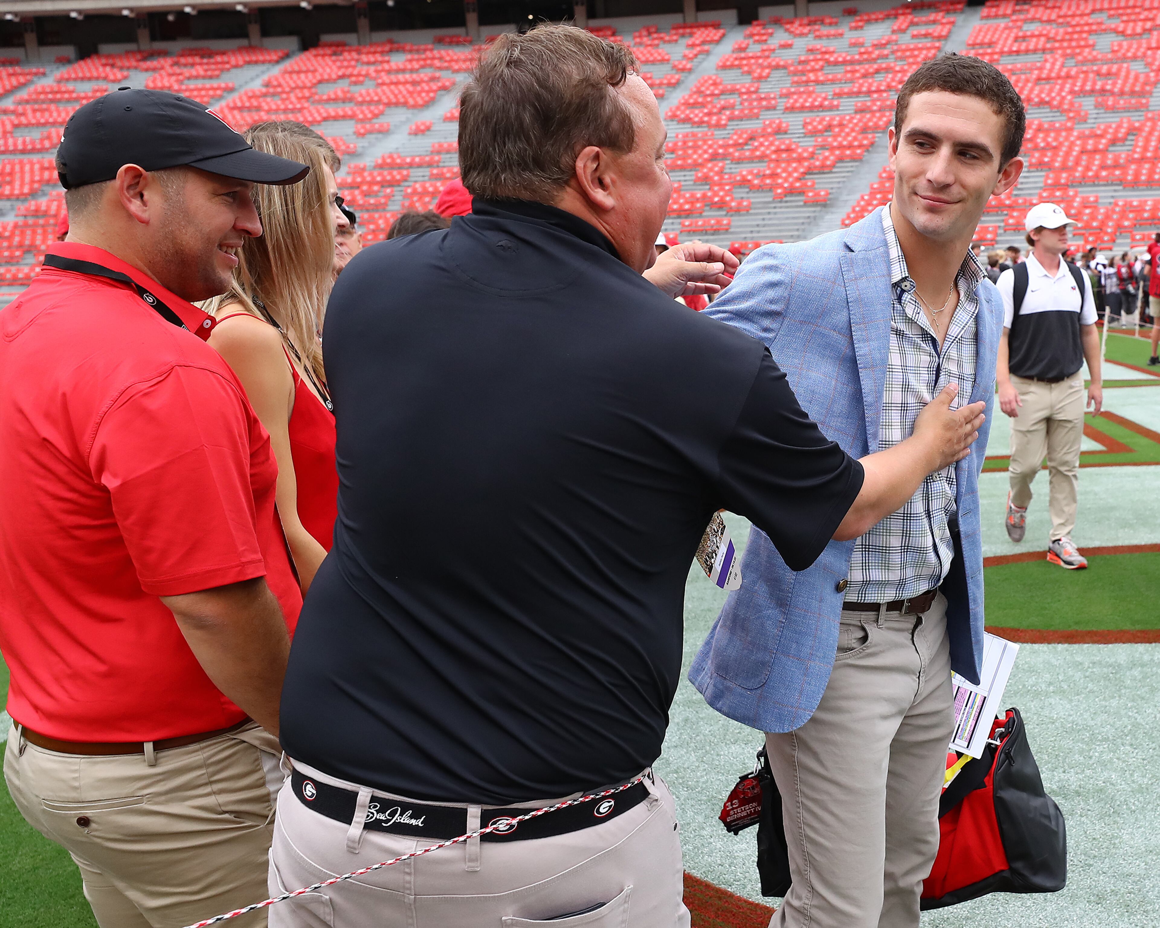 Georgia quarterback Stetson Bennett greets fans during the Dawg Walk before playing Samford in a NCAA college football game on Saturday, Sept. 10, 2022, in Athens. “Curtis Compton / Curtis Compton@ajc.com