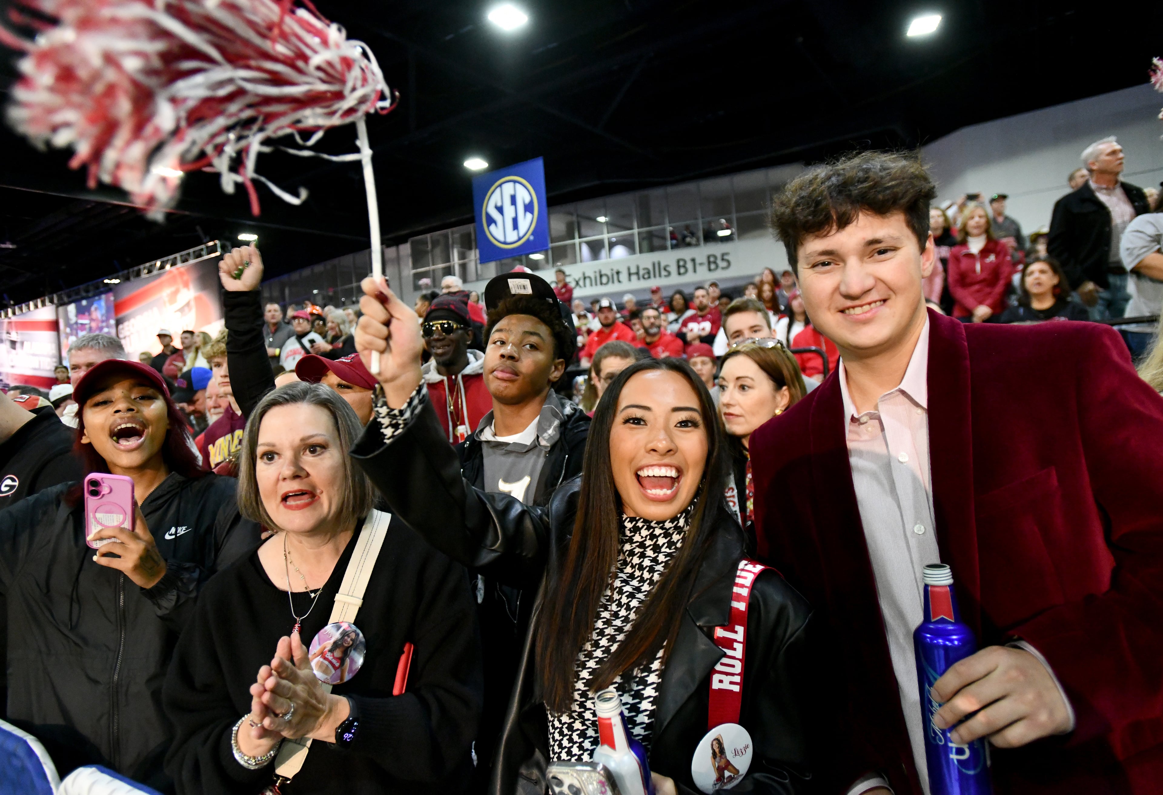 Alabama fans cheer during pep rallies at The Dr Pepper SEC FanFare ahead of the SEC Championship football game between Georgia and Alabama, Saturday, Dec. 6, 2025 in Atlanta. (Hyosub Shin/AJC)