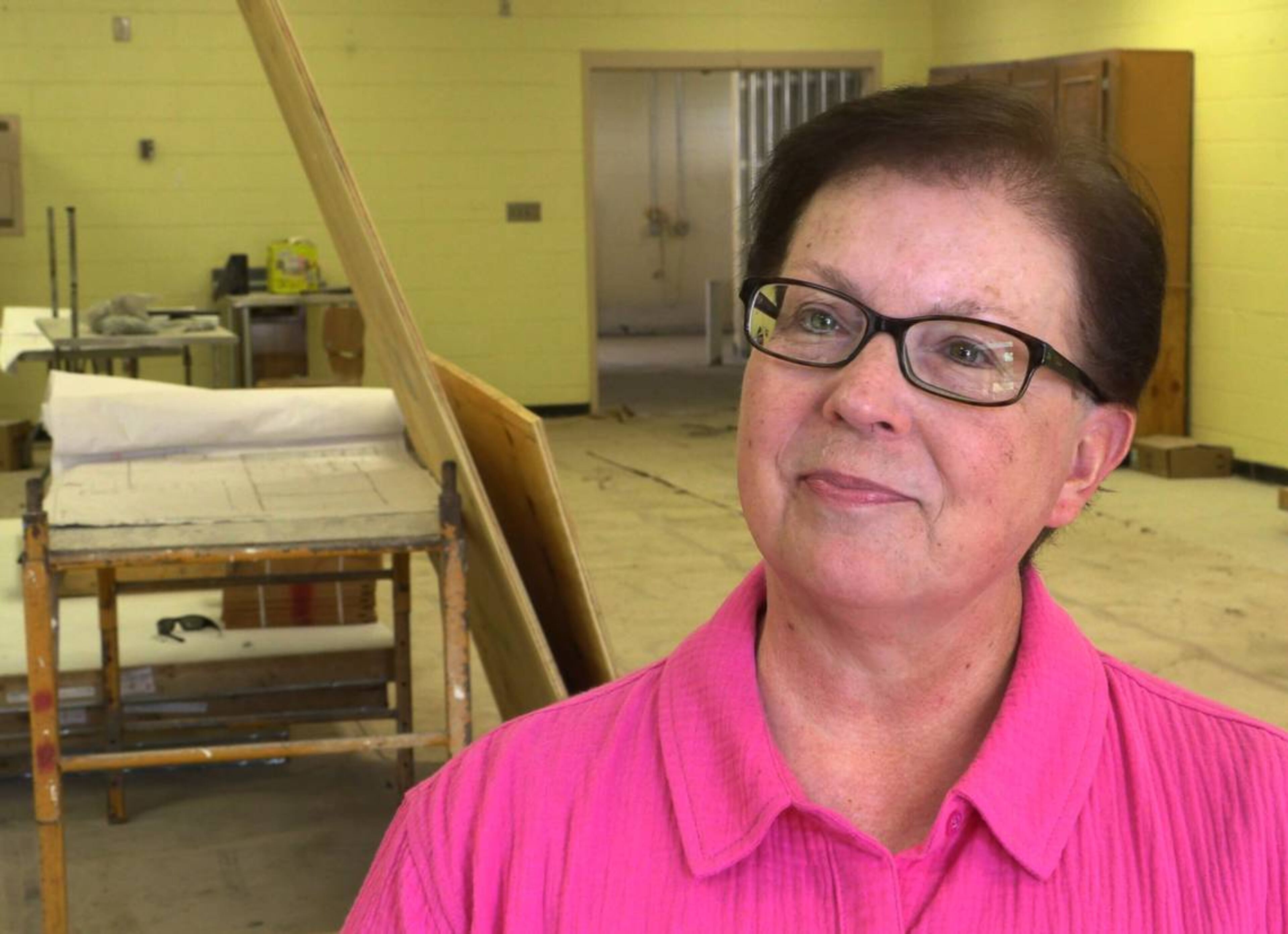 Kim Jenkins, executive director of Open Door Community House, talks about the construction of The Food Mill Shared Kitchen at the Fox Community Center, next to Fox Elementary School, in Columbus, Georgia. (Photo Courtesy of Mike Haskey)