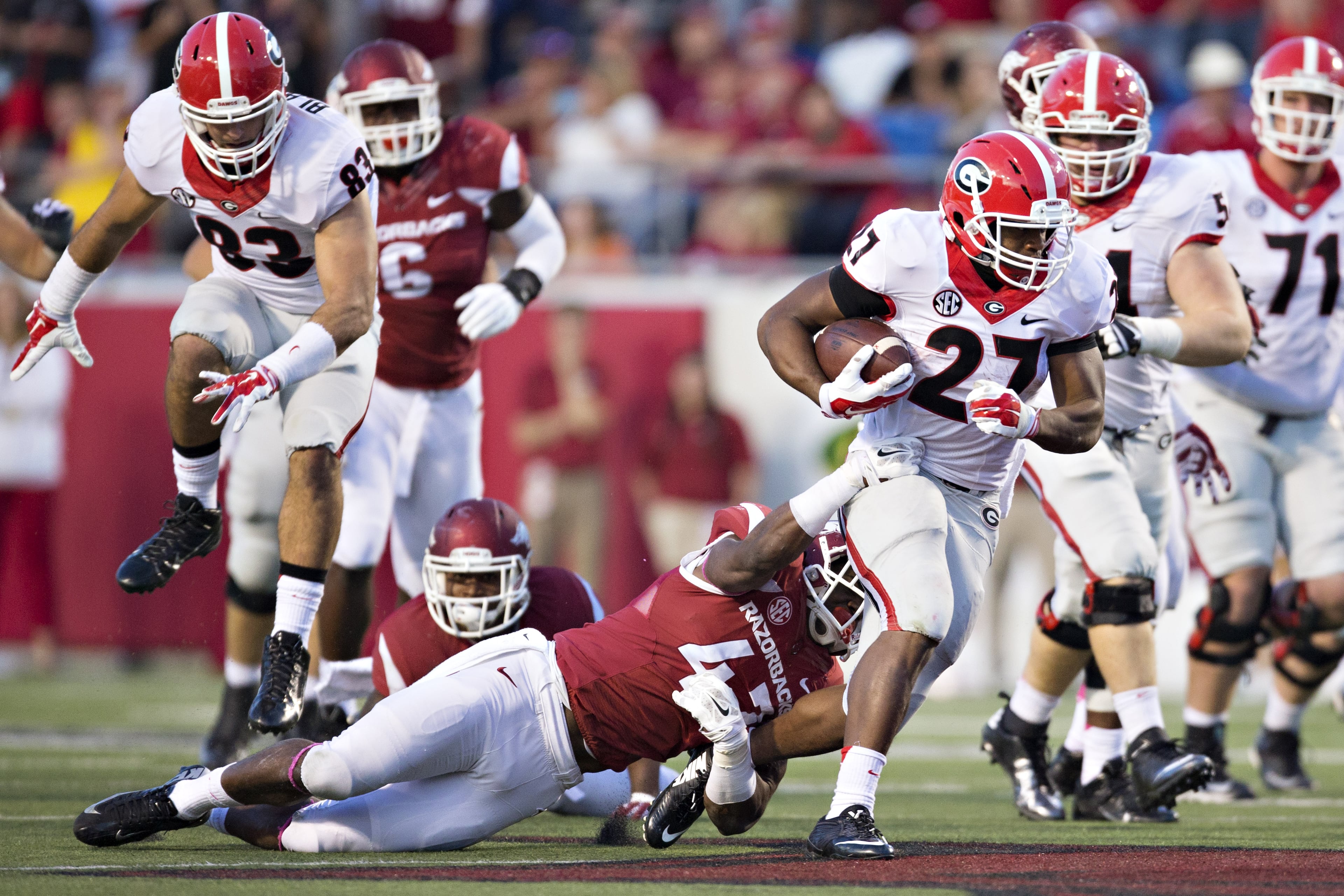 Nick Chubb #27 of the Georgia Bulldogs runs the ball against the Arkansas Razorbacks at War Memorial Stadium on October 18, 2014 in Little Rock, Arkansas. The Bulldogs defeated the Razorbacks 45-32. (Photo by Wesley Hitt/Getty Images)