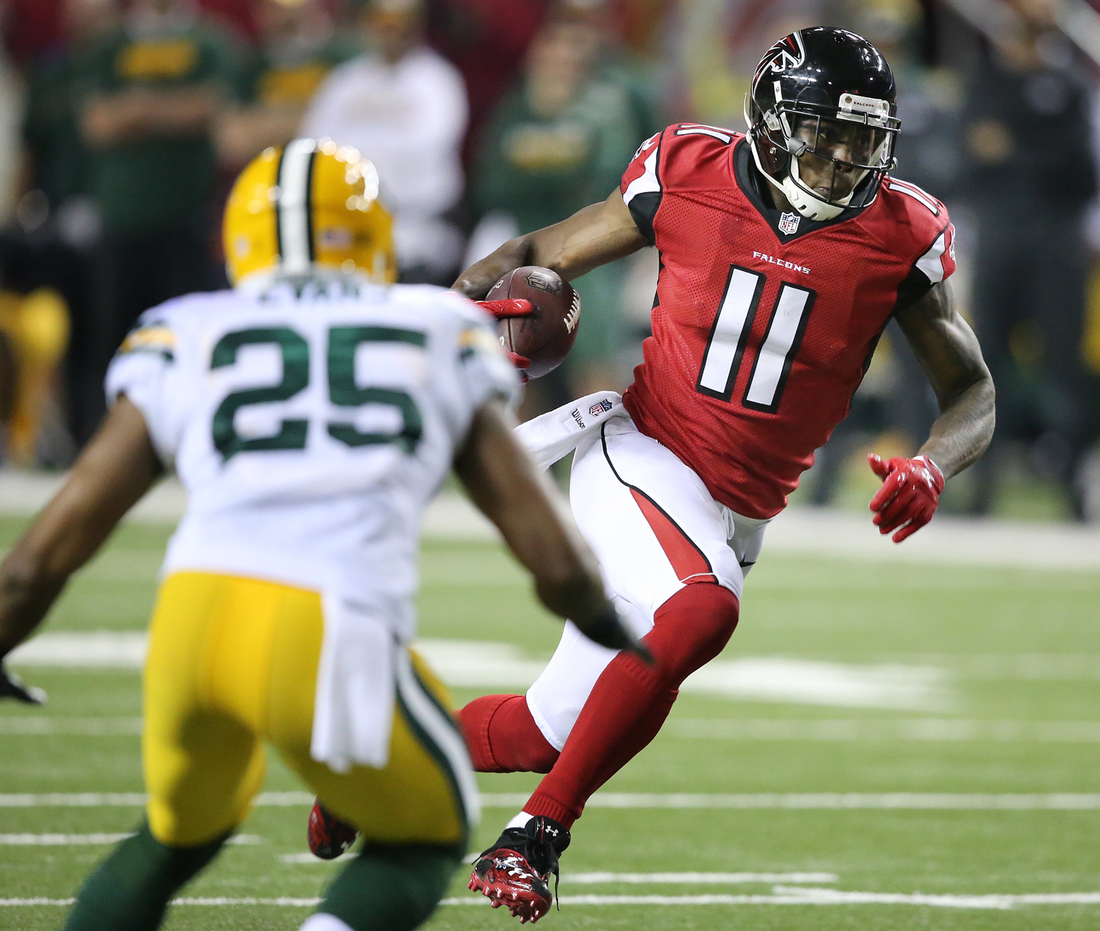 January 22, 2017, Atlanta: Julio Jones makes a first down catch and run against the Packers during the firsh half in the NFL football NFC Championship game on Sunday, Jan. 22, 2017, in Atlanta. Curtis Compton/ccompton@ajc.com