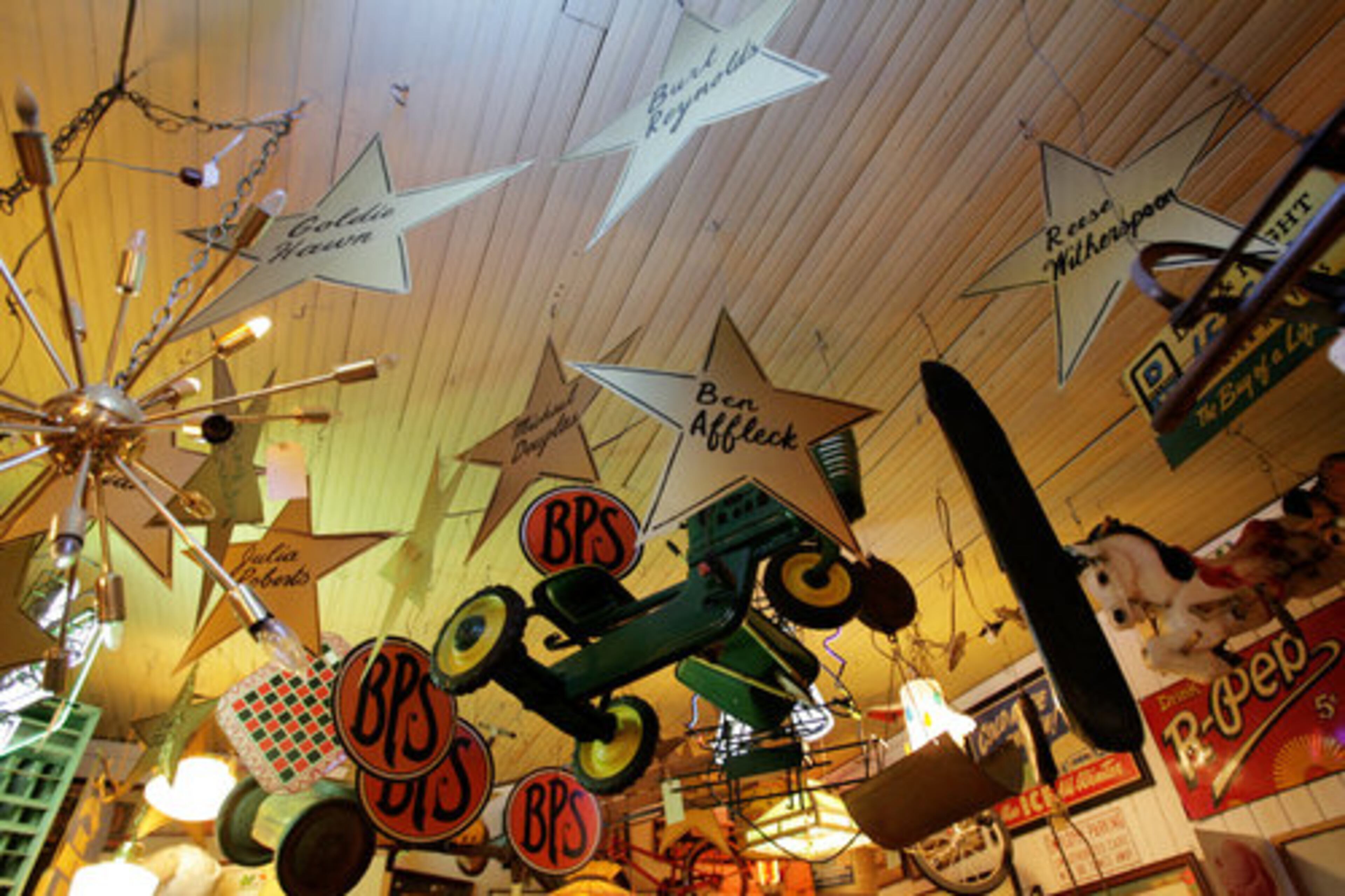 Chamblee: Biggar Antiques is packed with signs of all prices, with the rarest among them going for $4,500. "We're really the Americana antique experience," says co-owner Jeff Biggar.