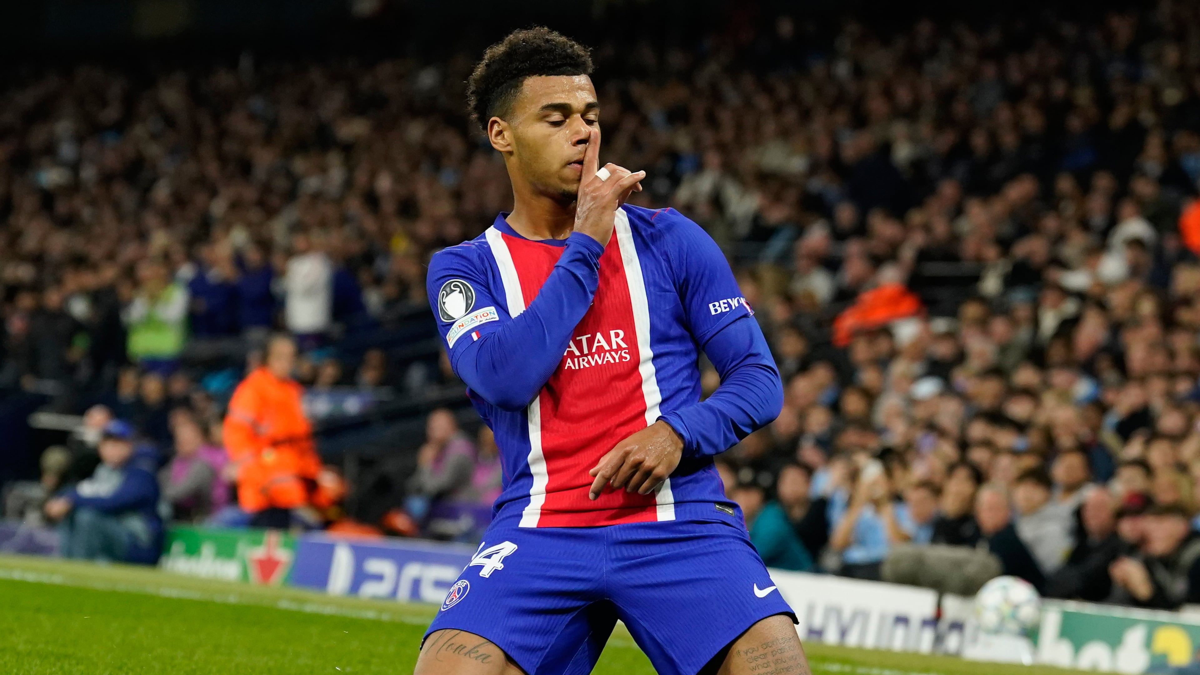 PSG's Desire Doue celebrates after scoring his side's opening goal during the Champions League opening phase soccer match between Manchester City and Paris Saint-Germain in Manchester, England, Wednesday, Oct. 14, 2026. (AP Photo/Dave Thompson)