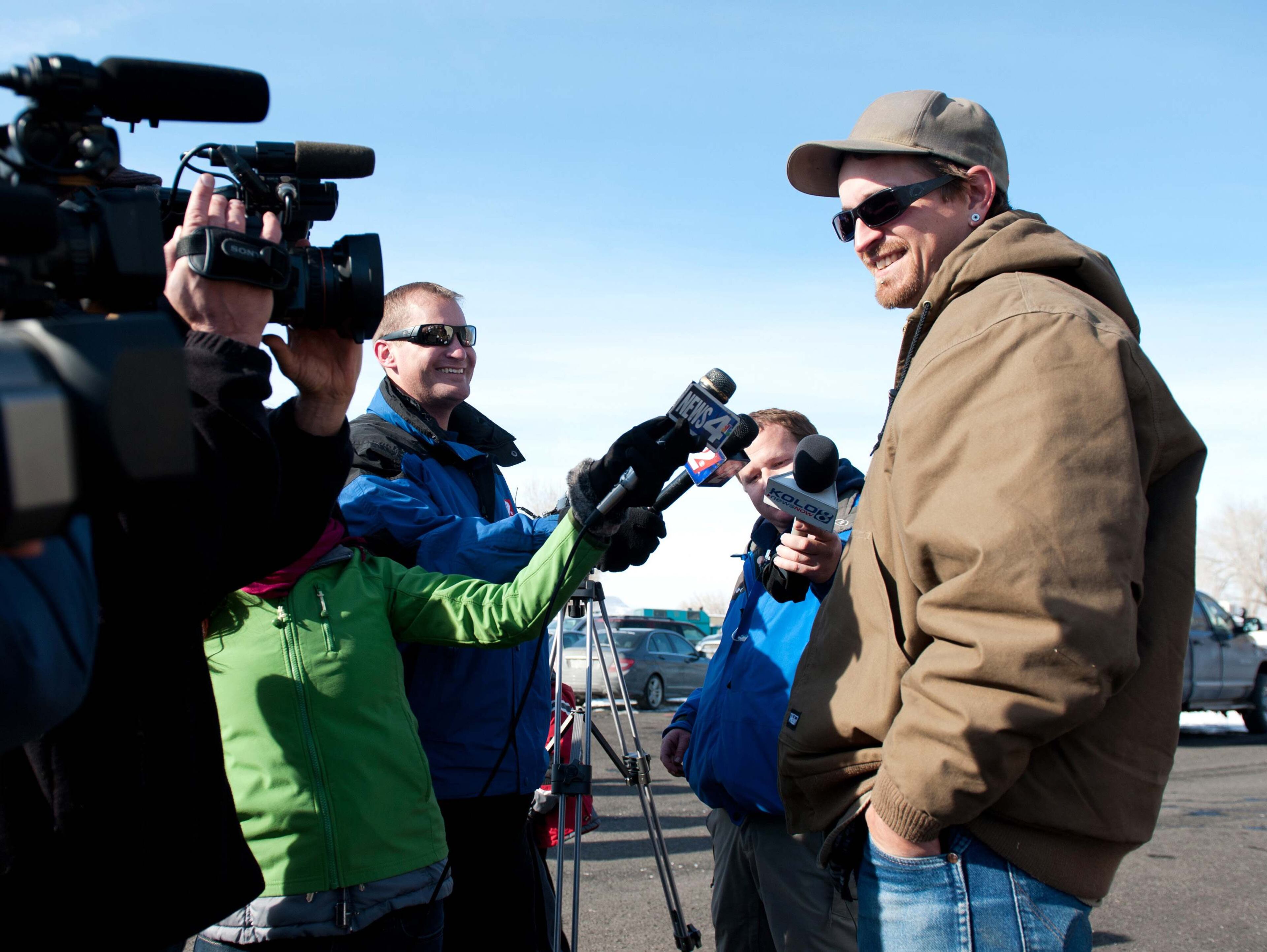 Chris Montes, of Lovelock, one of the rescuers that found a family in a remote mountain range northeast of Reno, speaks to the media in Lovelock, Nevada, December 10, 2013. A Nevada couple and four young children reported missing on Sunday were found safe by rescue workers on Tuesday huddled in a canyon, a dispatch supervisor for the Pershing County Sheriff's Office said. Montes said the group was stranded after their truck rolled over but that they were doing well and were in good spirits when he found them. REUTERS/James Glover