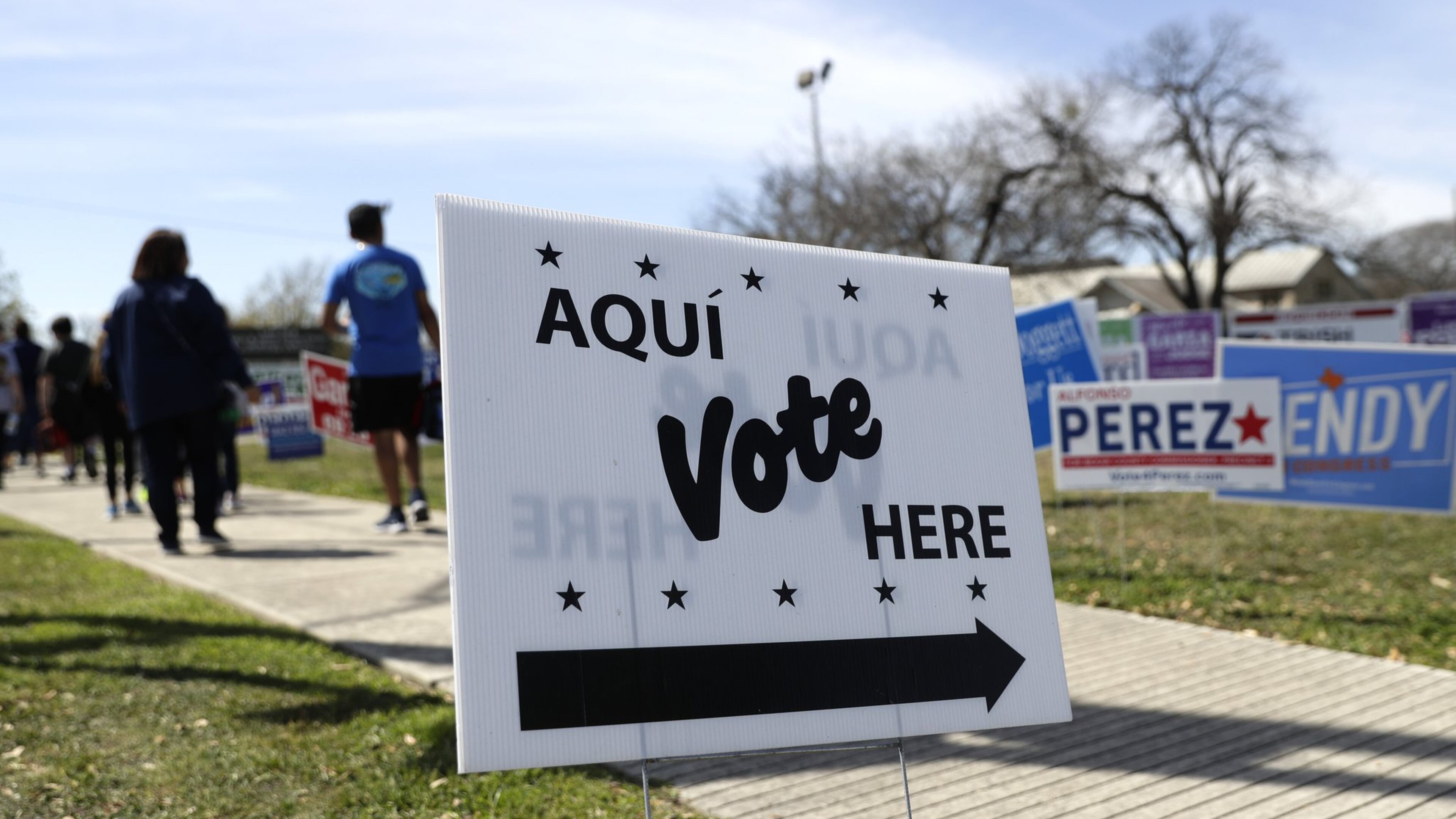 A sign shows voters where they can cast their ballots in San Antiono for Texas’ presidential primary. Texas is one of the top prizes in Super Tuesday’s voting, trailing only California in the number of delegates up for grabs in the race for the Democratic nomination. (AP Photo/Eric Gay)