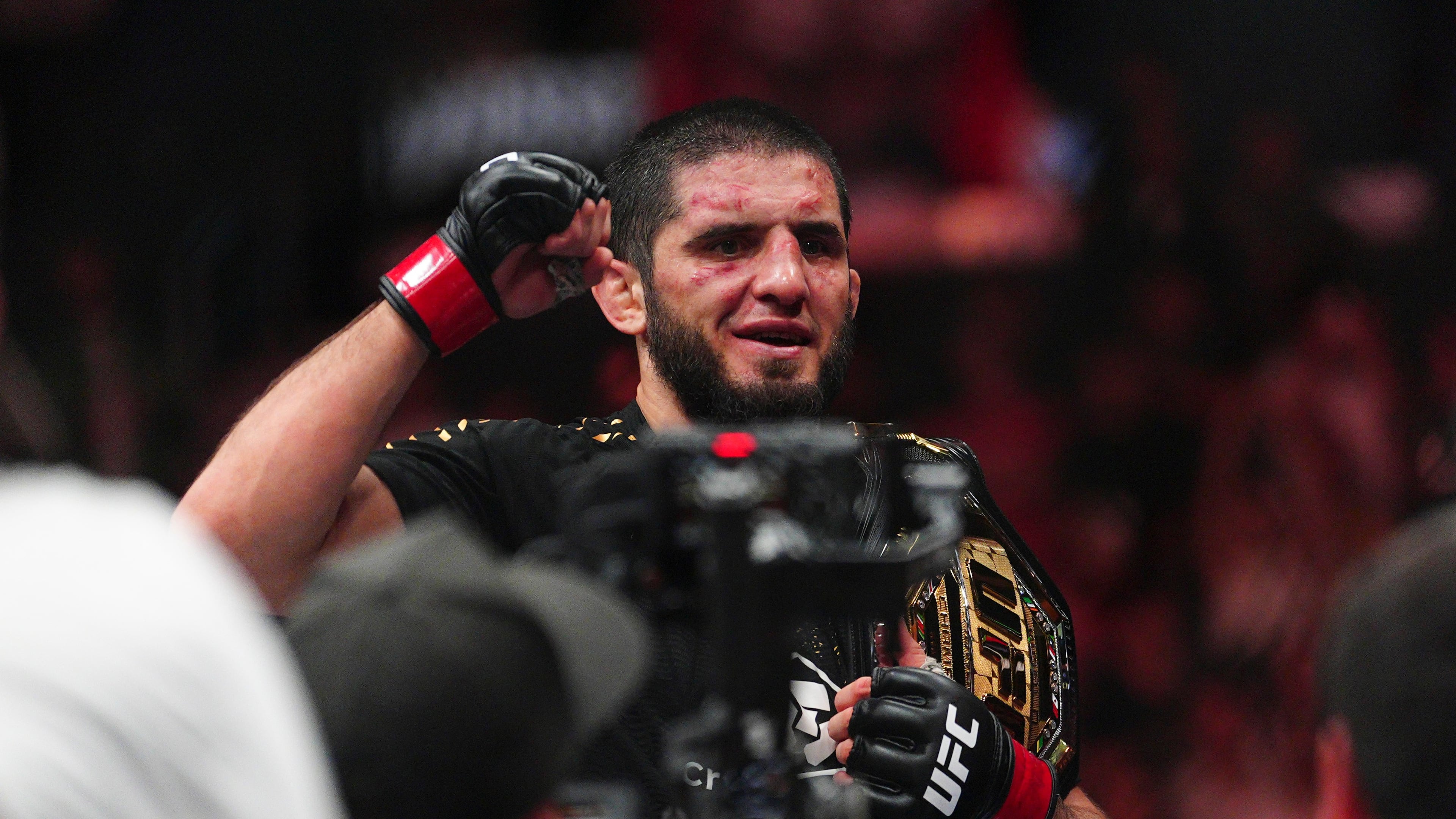 Islam Makhachev reacts after defeating Ian Machado Garry in a welterweight title fight at the UFC 330 mixed martial arts event Sunday, Aug. 16, 2026, in Philadelphia. (AP Photo/Derik Hamilton)