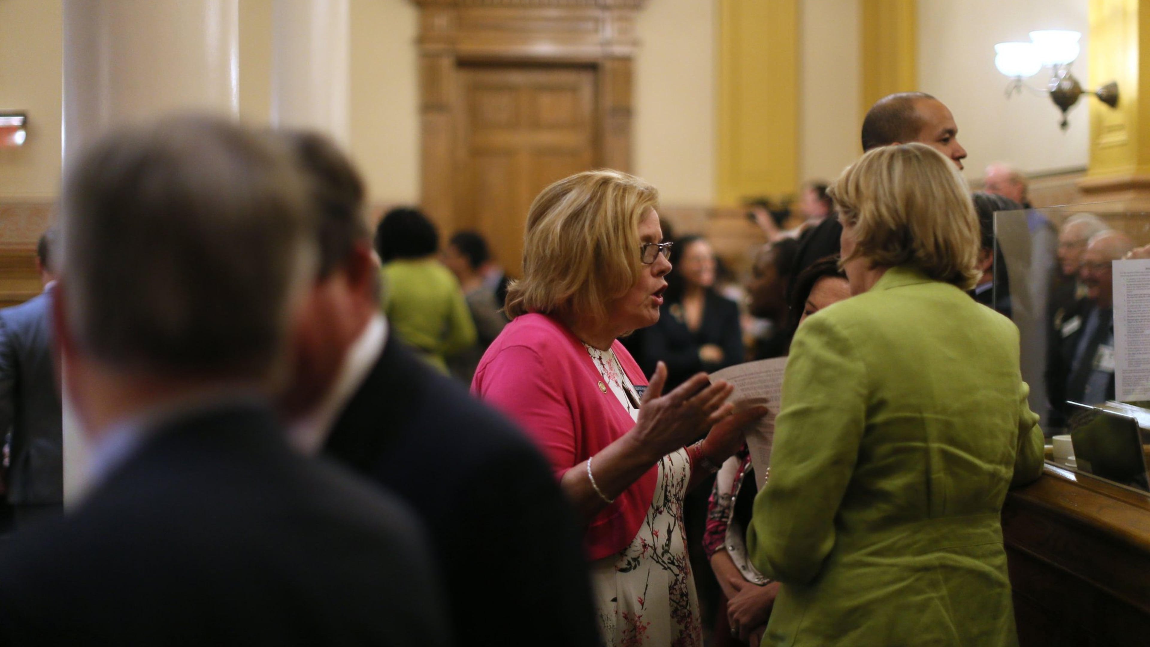Republican Sen. Renee S. Unterman (left) confers with House Speaker Pro-Tempore Jan Jones late in the night Thursday, March 24 — the 40th and final day of the Georgia 2016 legislative session. Rape kit legislation that was passed in the House but blocked by Unterman went on to clear its final hurdle. BOB ANDRES / BANDRES@AJC.COM