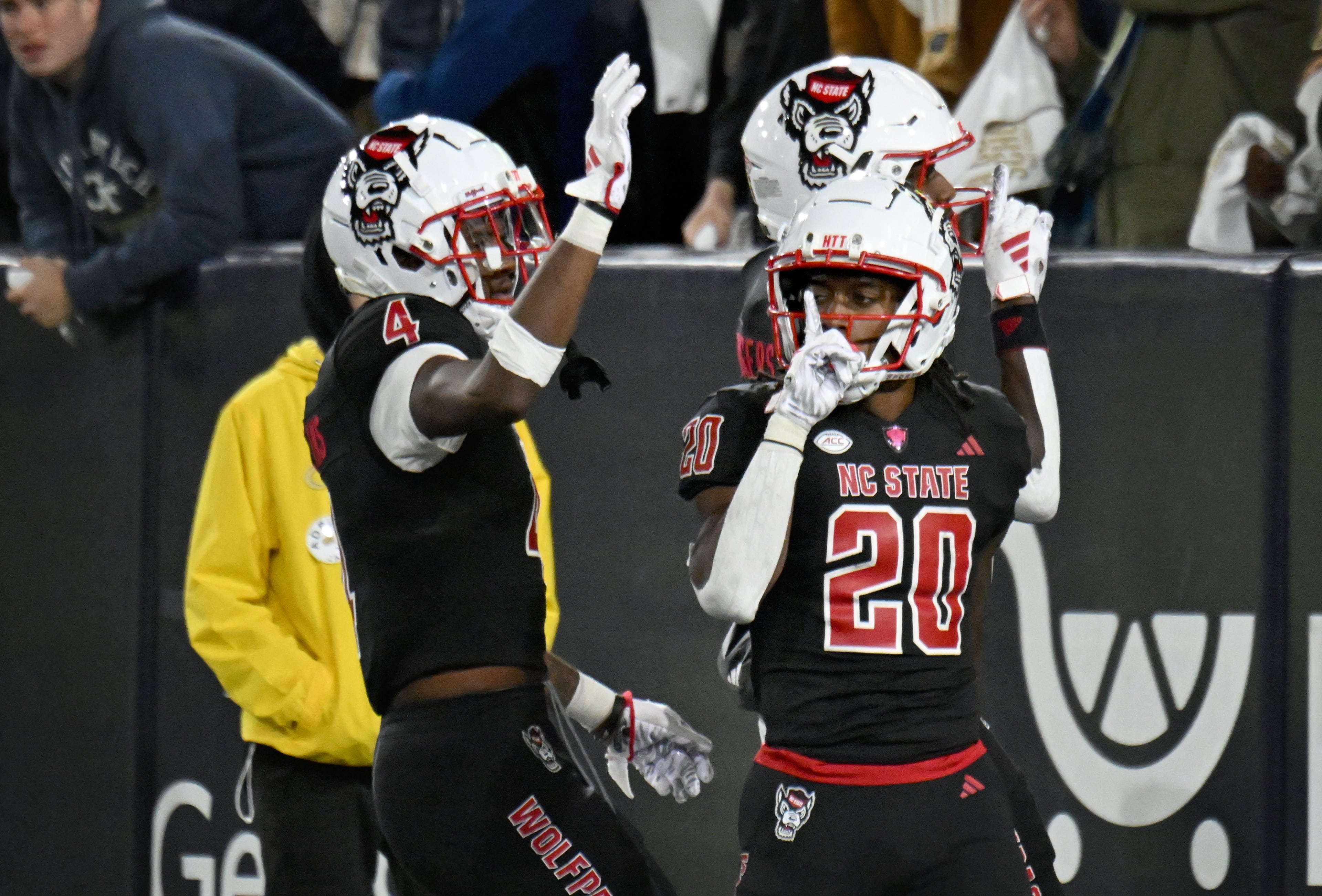 North Carolina State running back Hollywood Smothers (20) celebrates after scoring a touchdown during the fourth quarter in an NCAA college football game at Georgia Tech's Bobby Dodd Stadium, Thursday, November 21, 2024, in Atlanta. Georgia Tech won 30-29 over North Carolina State. (Hyosub Shin / AJC)