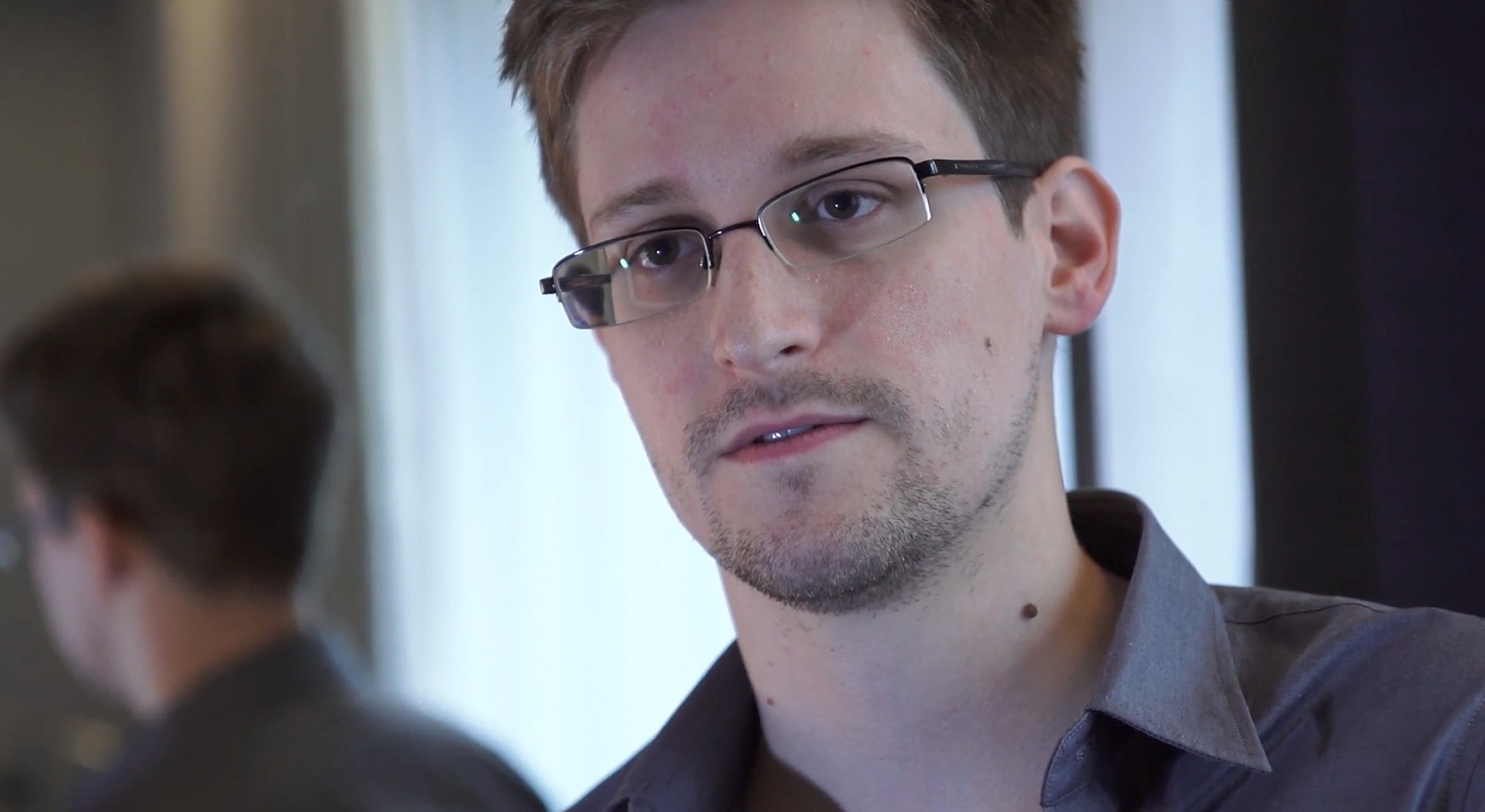 In this handout photo provided by The Guardian, Edward Snowden speaks during an interview in Hong Kong. Snowden, a 29-year-old former technical assistant for the CIA, revealed details of top-secret surveillance conducted by the United States' National Security Agency regarding telecom data. (Photo by The Guardian via Getty Images)