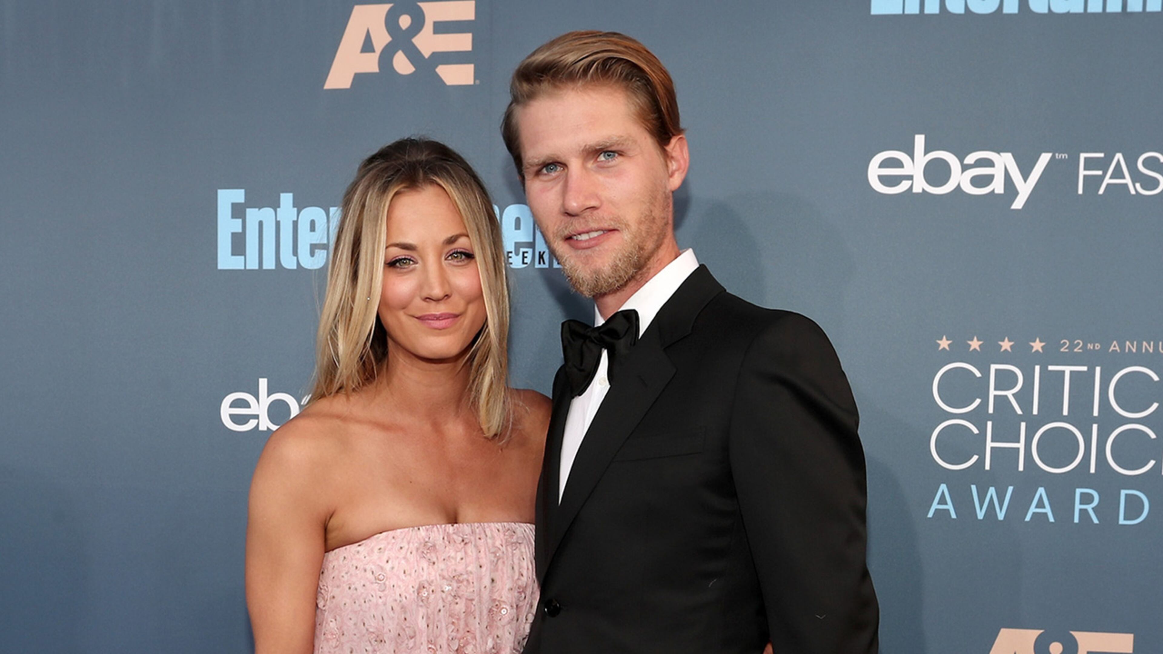 Actress Kaley Cuoco (L) became engaged to boyfriend Karl Cook on her 32nd birthday.