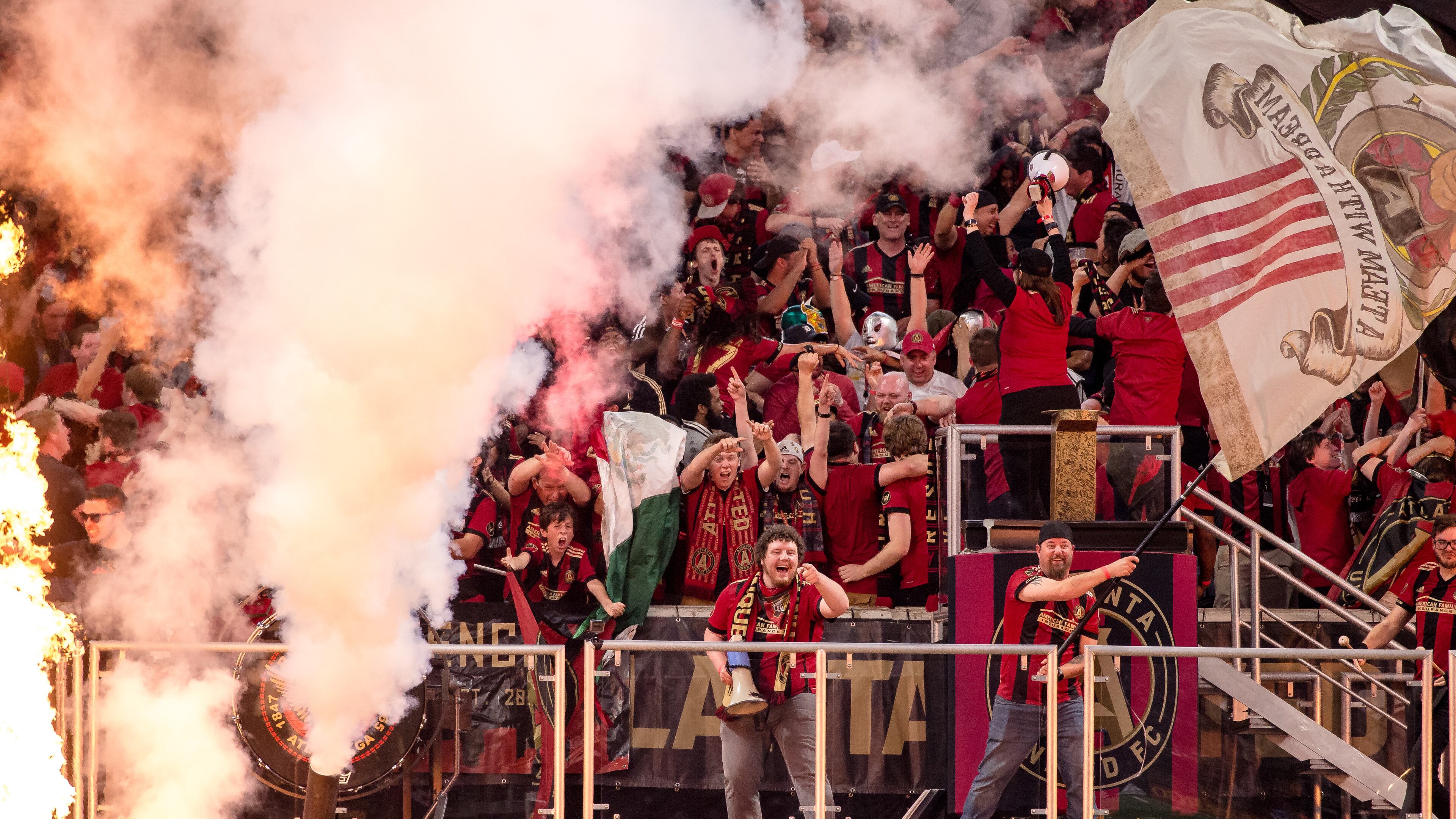 Atlanta United's supporters celebrate during Sunday's game against NYCFC at Mercedes-Benz Stadium.
